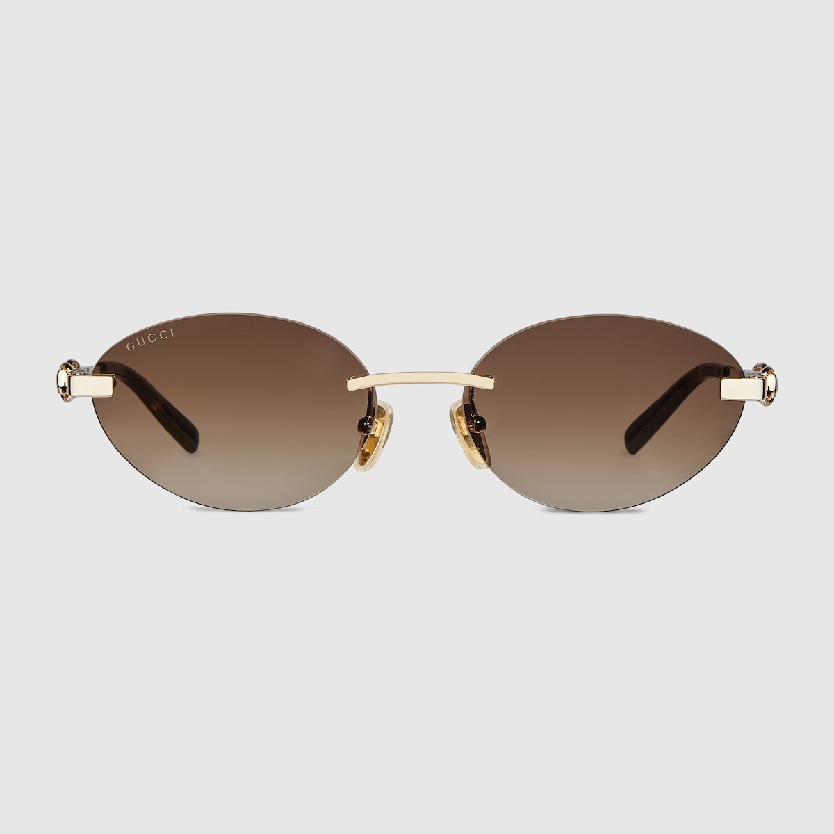 *GUCCI* サングラス レディース Frameless oval sunglasses in ivory | GUCCI® US