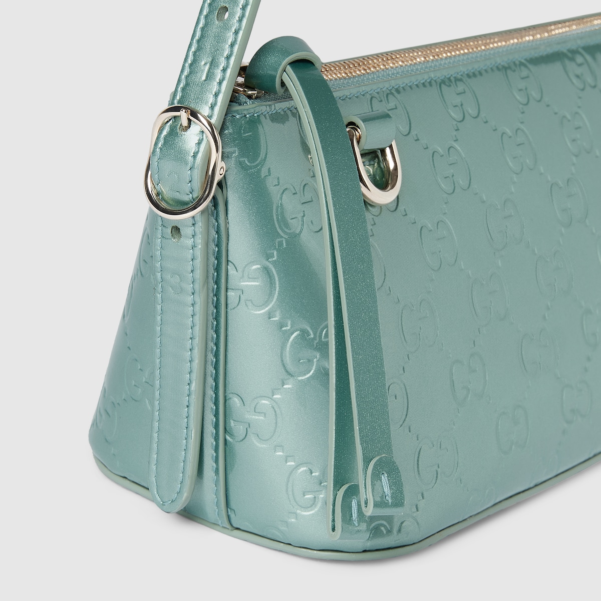 GG Emblem small shoulder bag in light blue GG leather | GUCCI® US