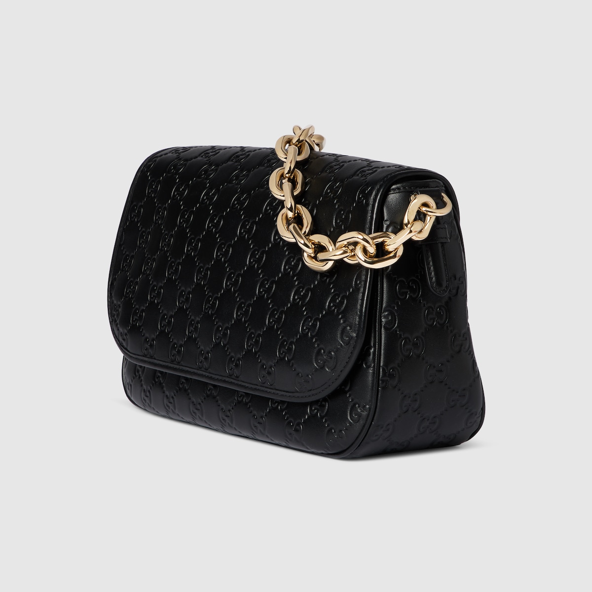 GG Emblem medium shoulder bag in black GG leather | GUCCI® US