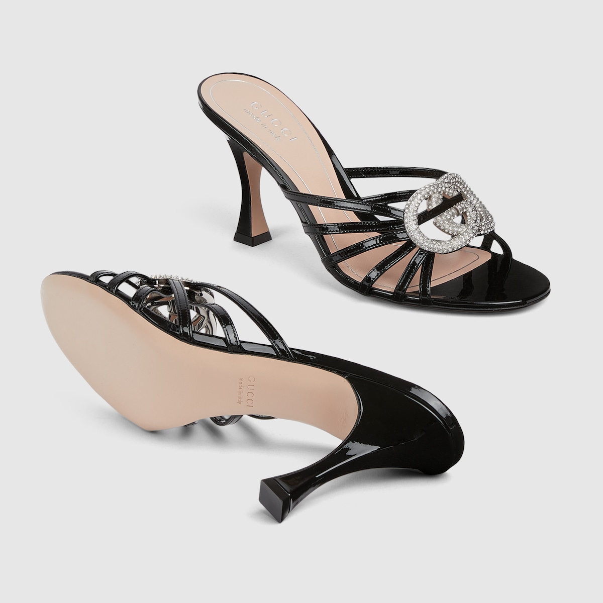 Women's slide sandal with crystal Interlocking G in black patent