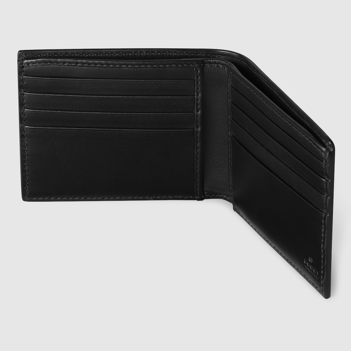 GG Emblem bi-fold wallet in black GG leather | GUCCI® US