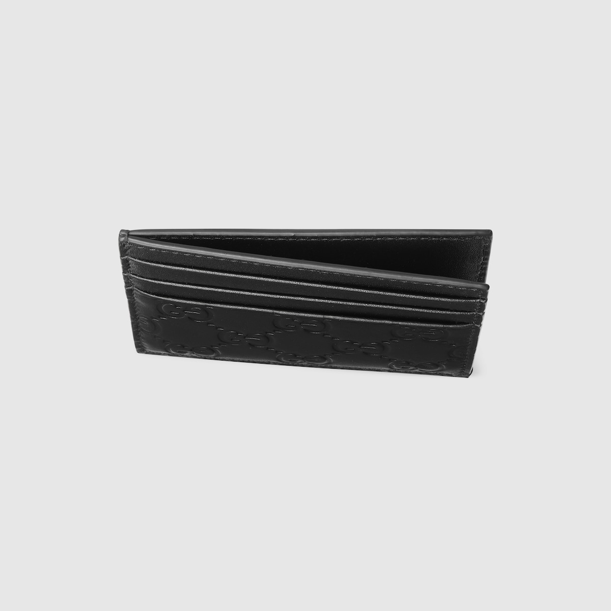 GG Emblem card case in black GG leather | GUCCI® US