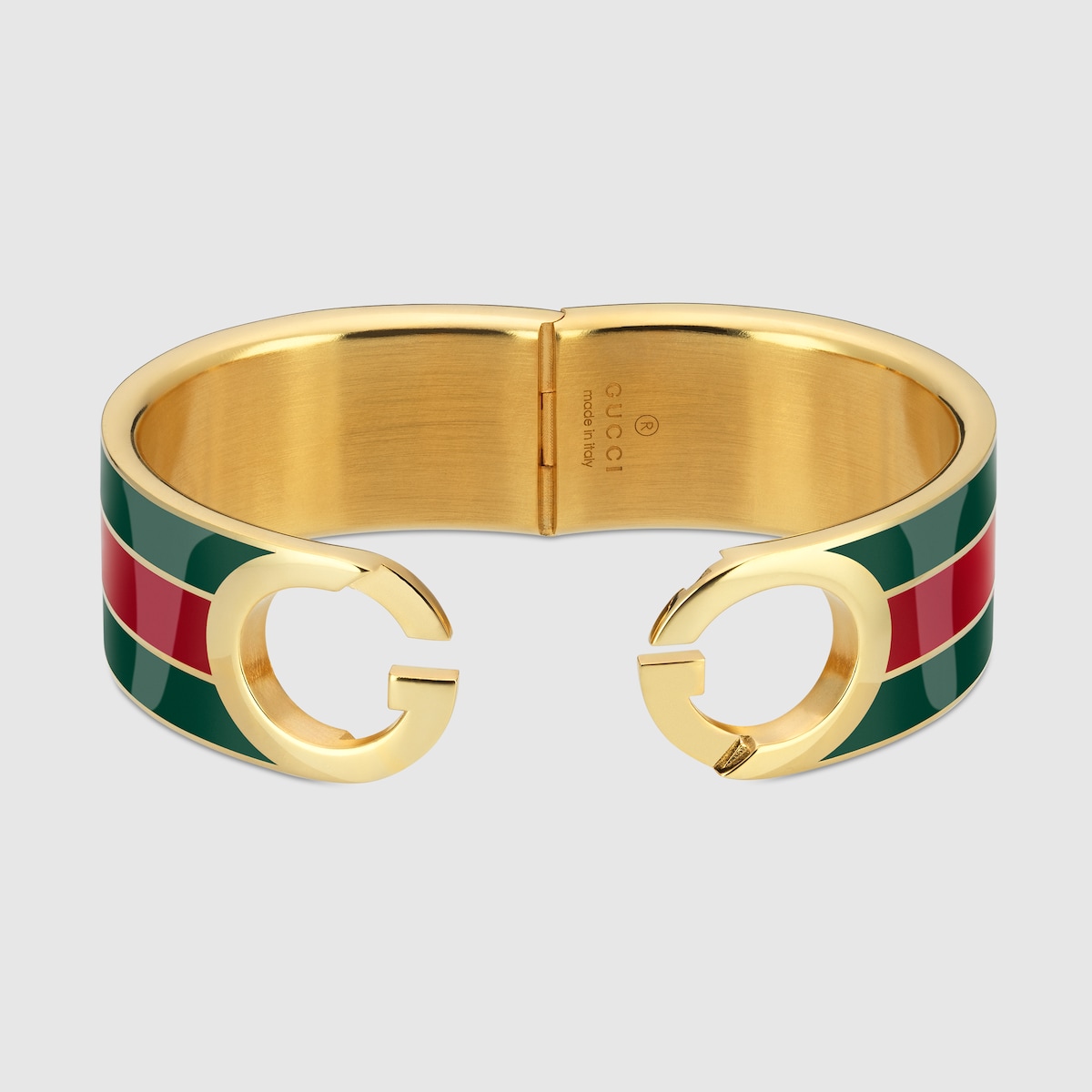 Gucci Interlocking bangle bracelet in gold-toned brass | GUCCI® US