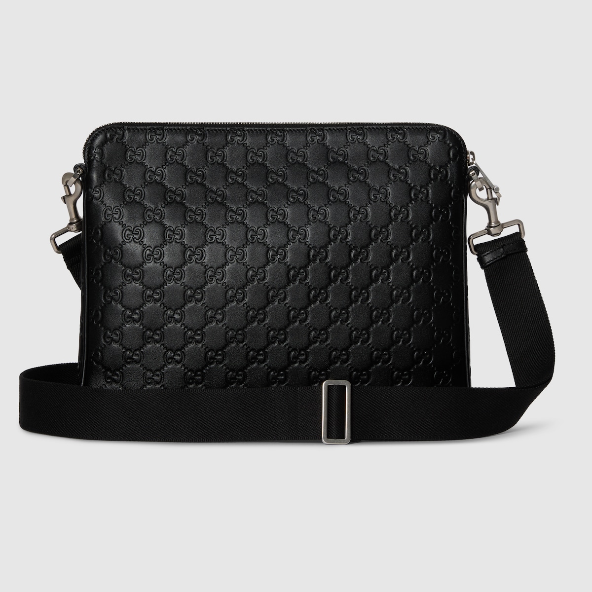 GG Emblem medium crossbody bag in black GG leather | GUCCI® US