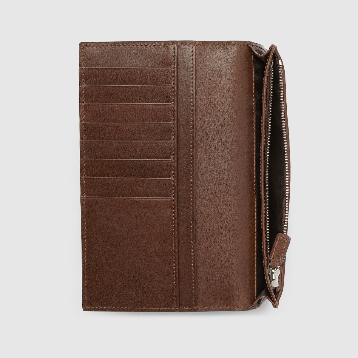 GG Emblem long wallet in brown and black GG leather | GUCCI® US