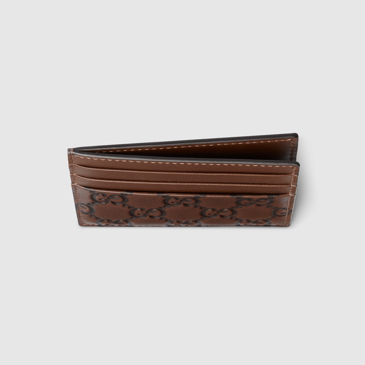 GG Emblem card case in brown and black GG leather | GUCCI® US