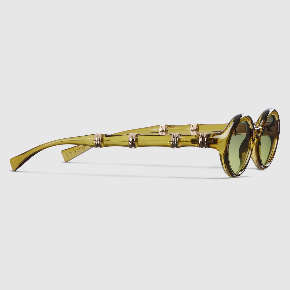 Oval frame sunglasses in transparent green | GUCCI® US