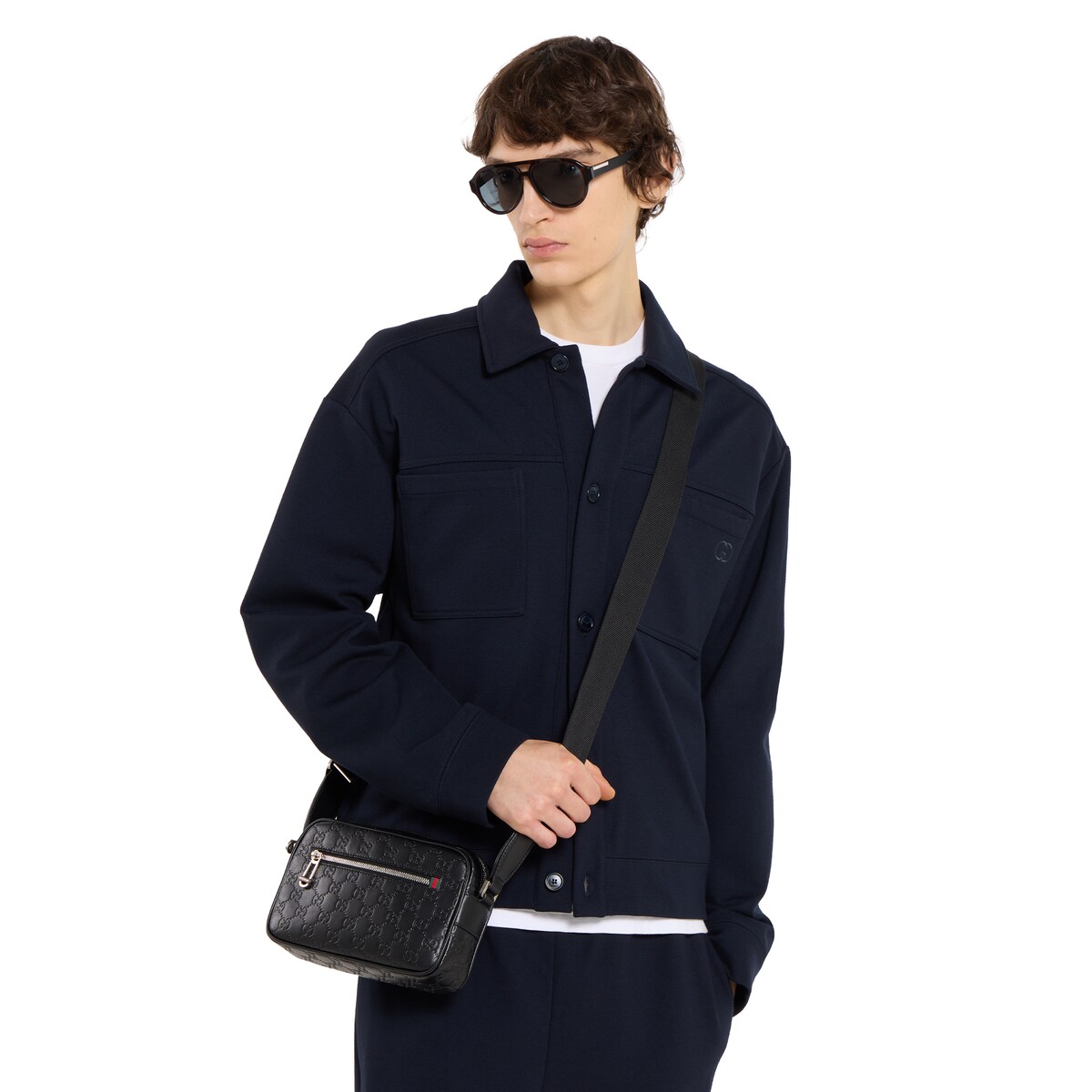 GG Emblem small crossbody bag in black GG leather