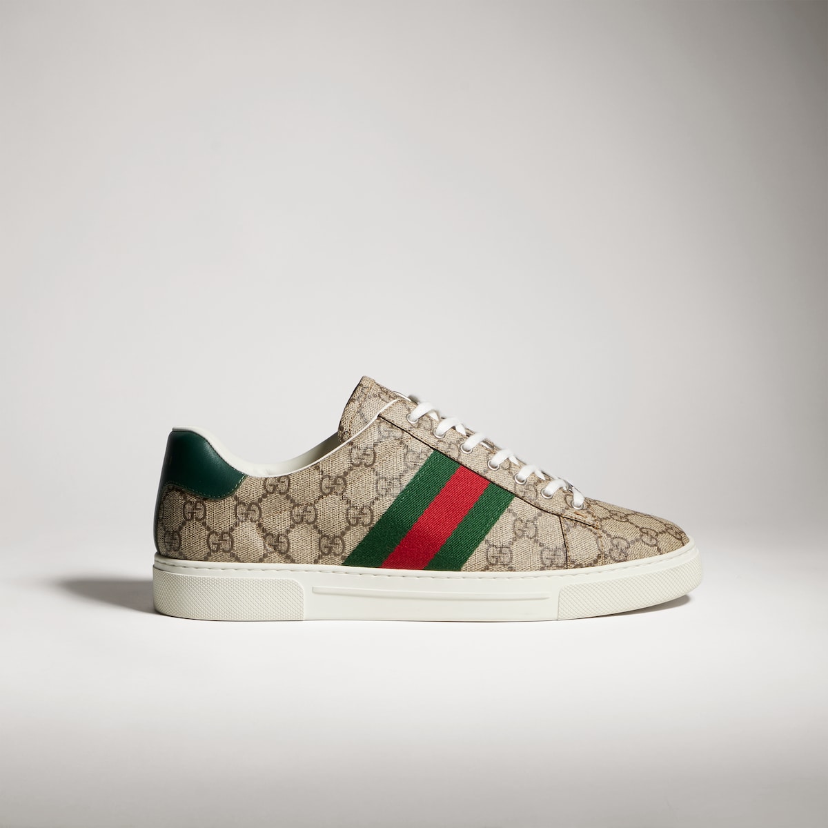 Men's Gucci Ace sneaker with Web in beige and ebony GG Supreme