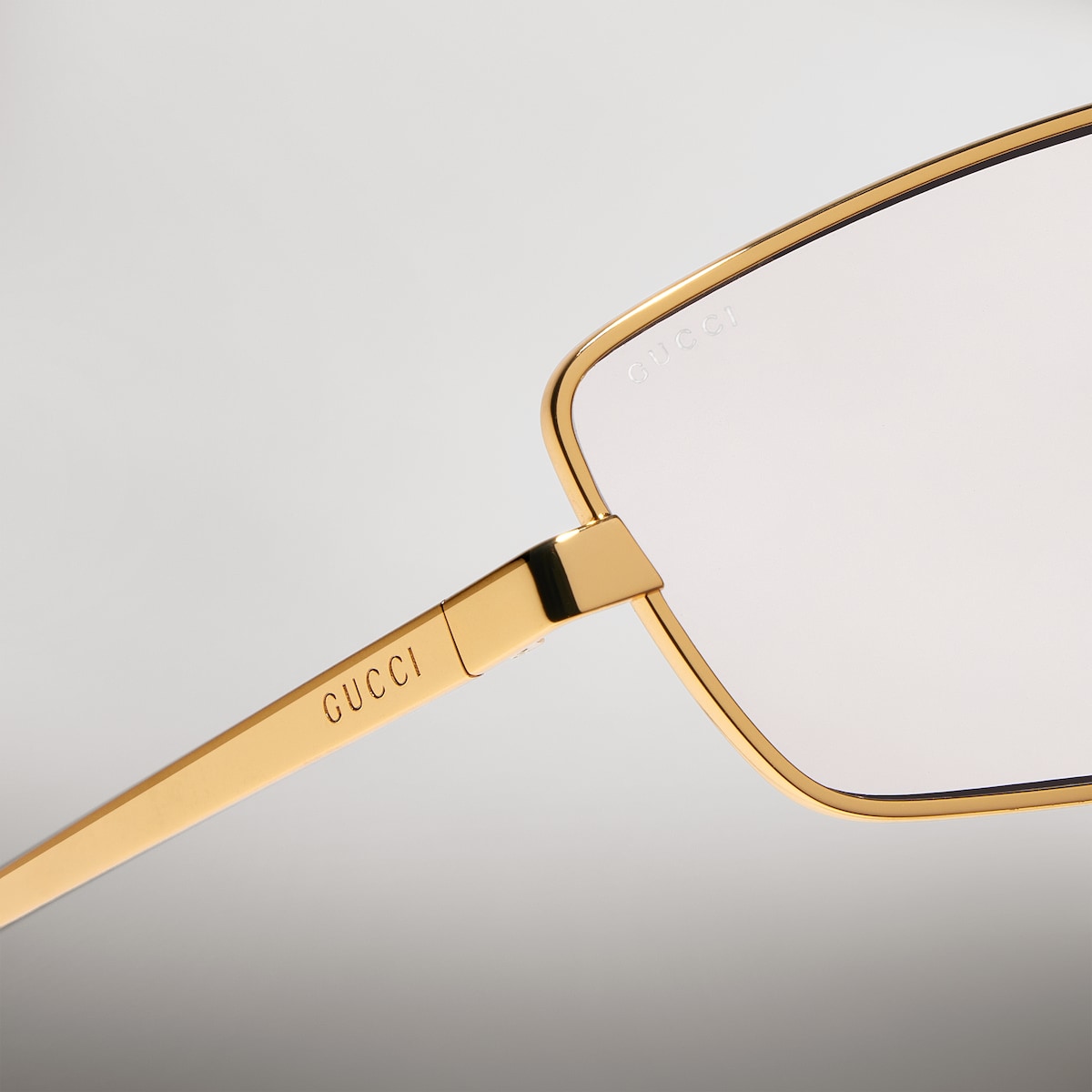 Rectangular frame sunglasses in gold-toned | GUCCI® AU