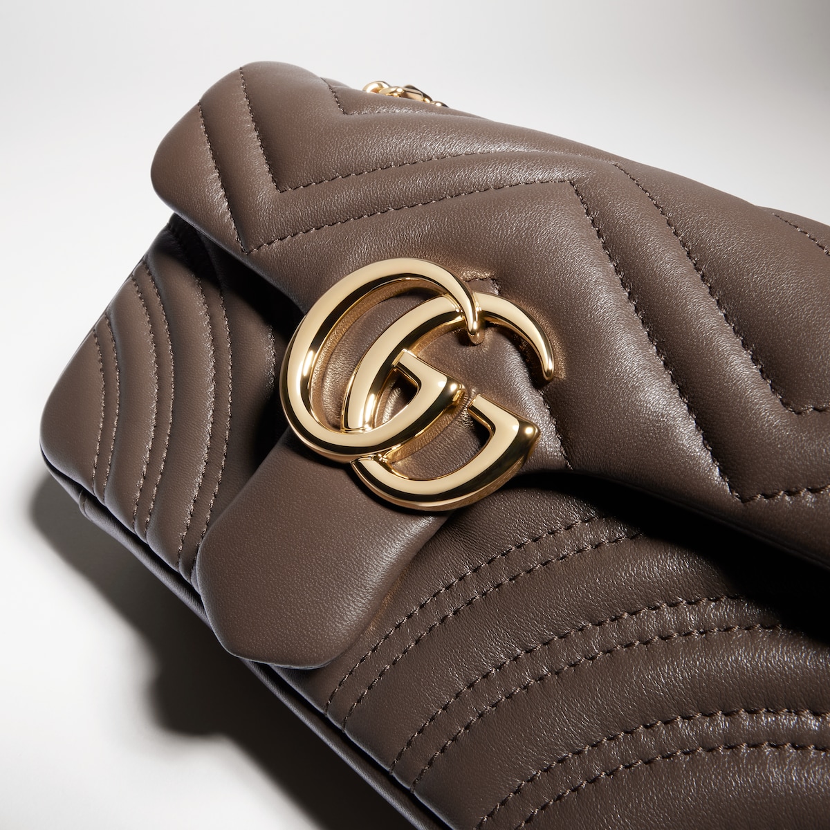 GG Marmont small shoulder bag in dark taupe leather | GUCCI® CH