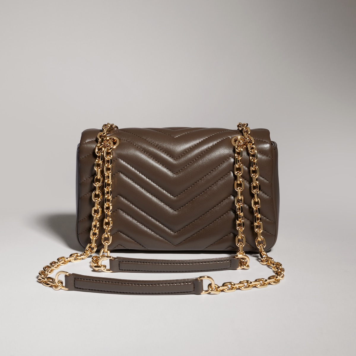 GG Marmont small shoulder bag in dark taupe leather | GUCCI® CH