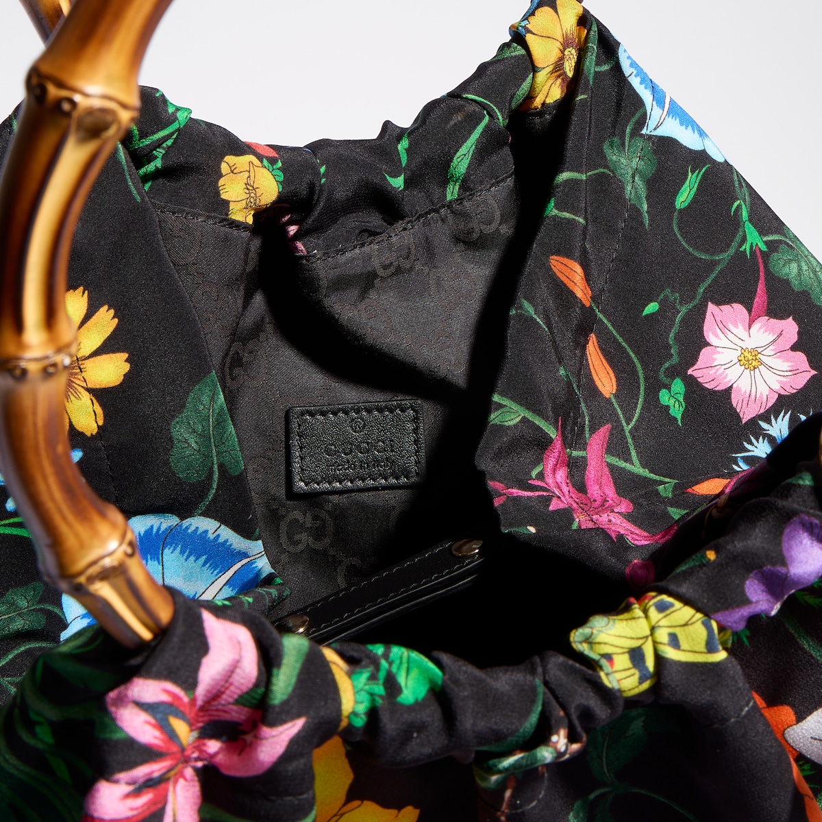Silk maxi tote bag with bamboo handle in black and multicolor silk
