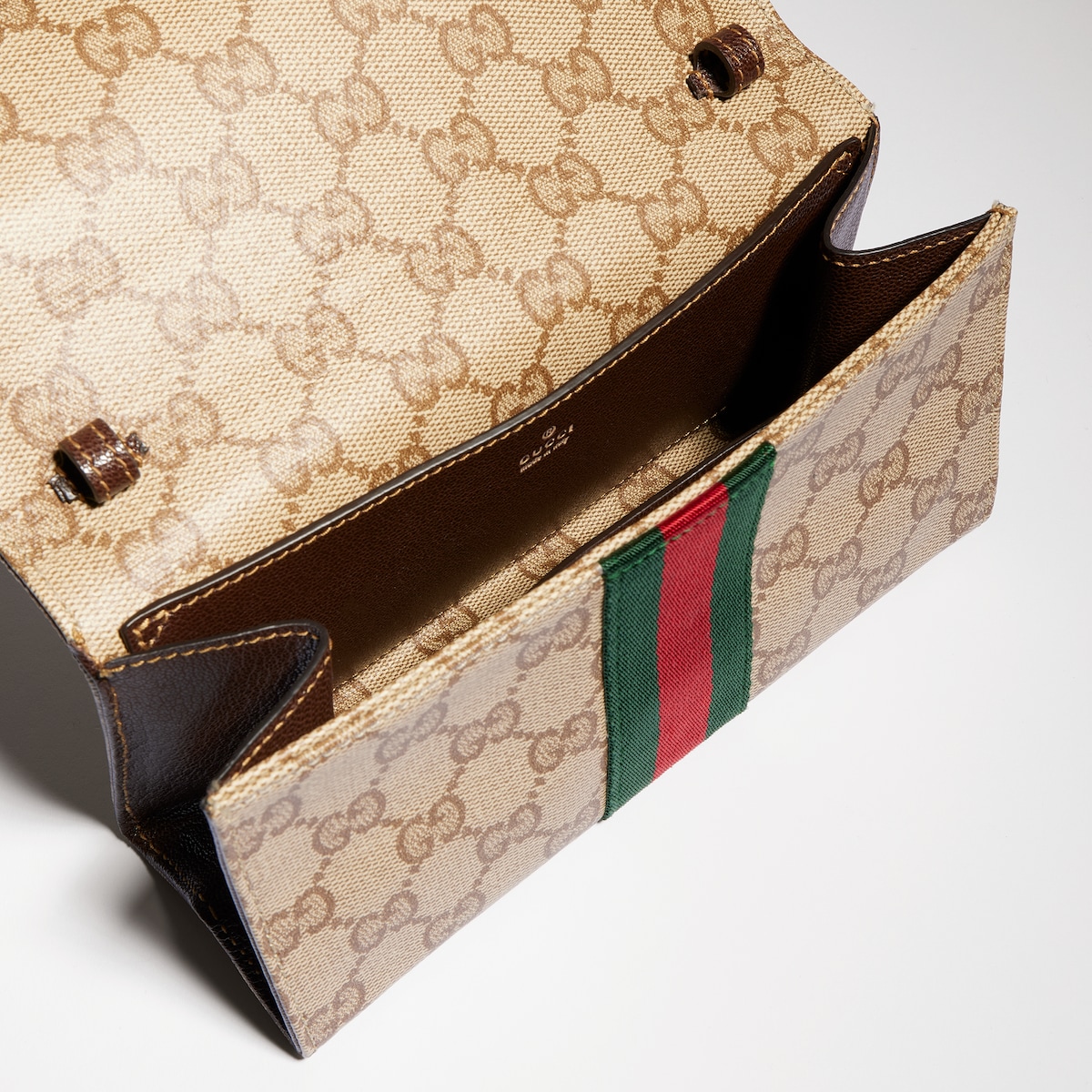 Small pouch with strap and Web in sand and brown GG canvas | GUCCI® US