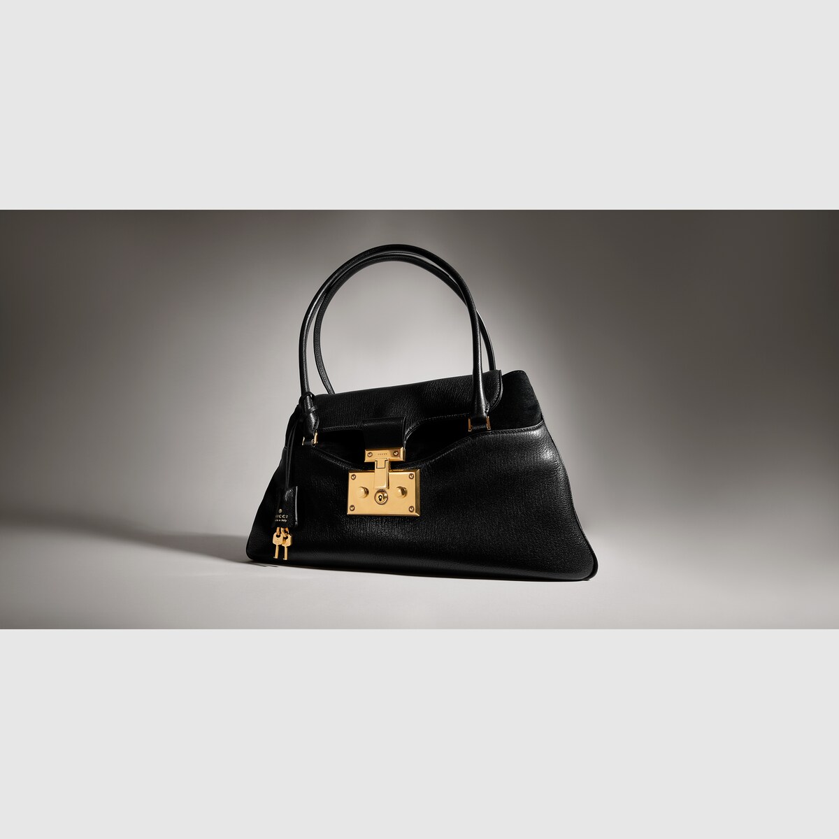 Large tote bag with lock in dark brown leather - thumbnail 4