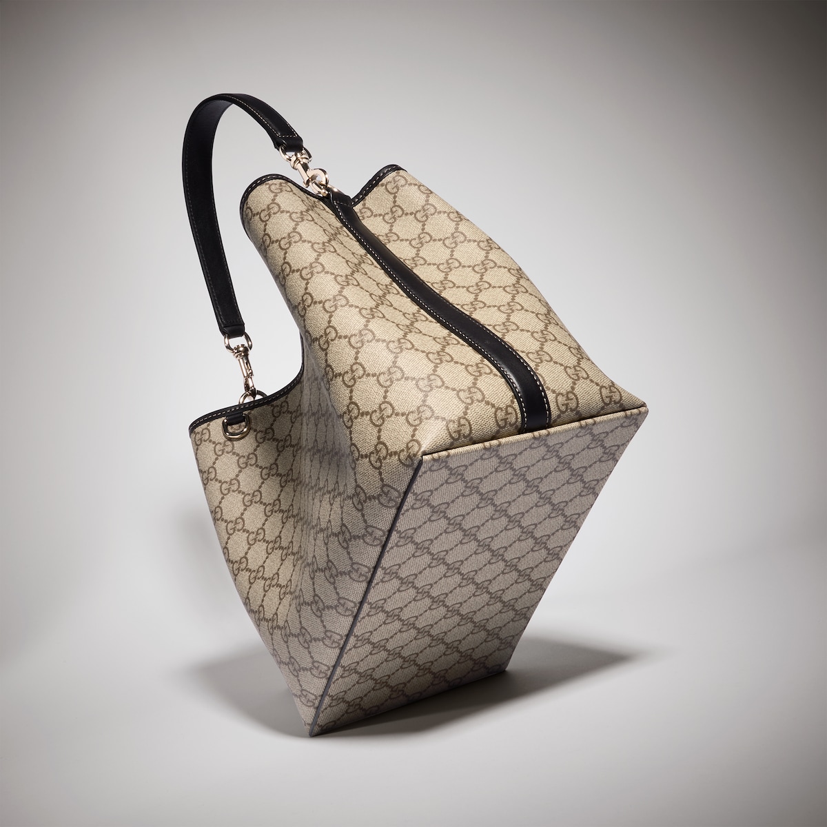 GG Emblem medium bucket bag in beige and brown GG fabric