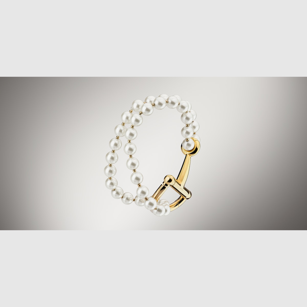 Bracelet with stirrup in gold-toned brass - thumbnail 2