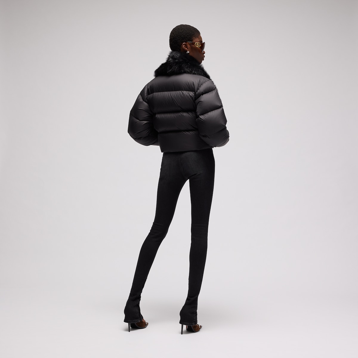 Padded polyester jacket with shearling in black
