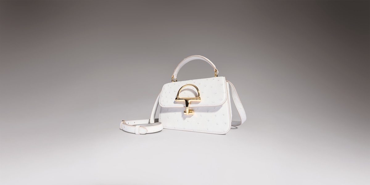 Gucci Siena ostrich small top handle bag in white | GUCCI® US