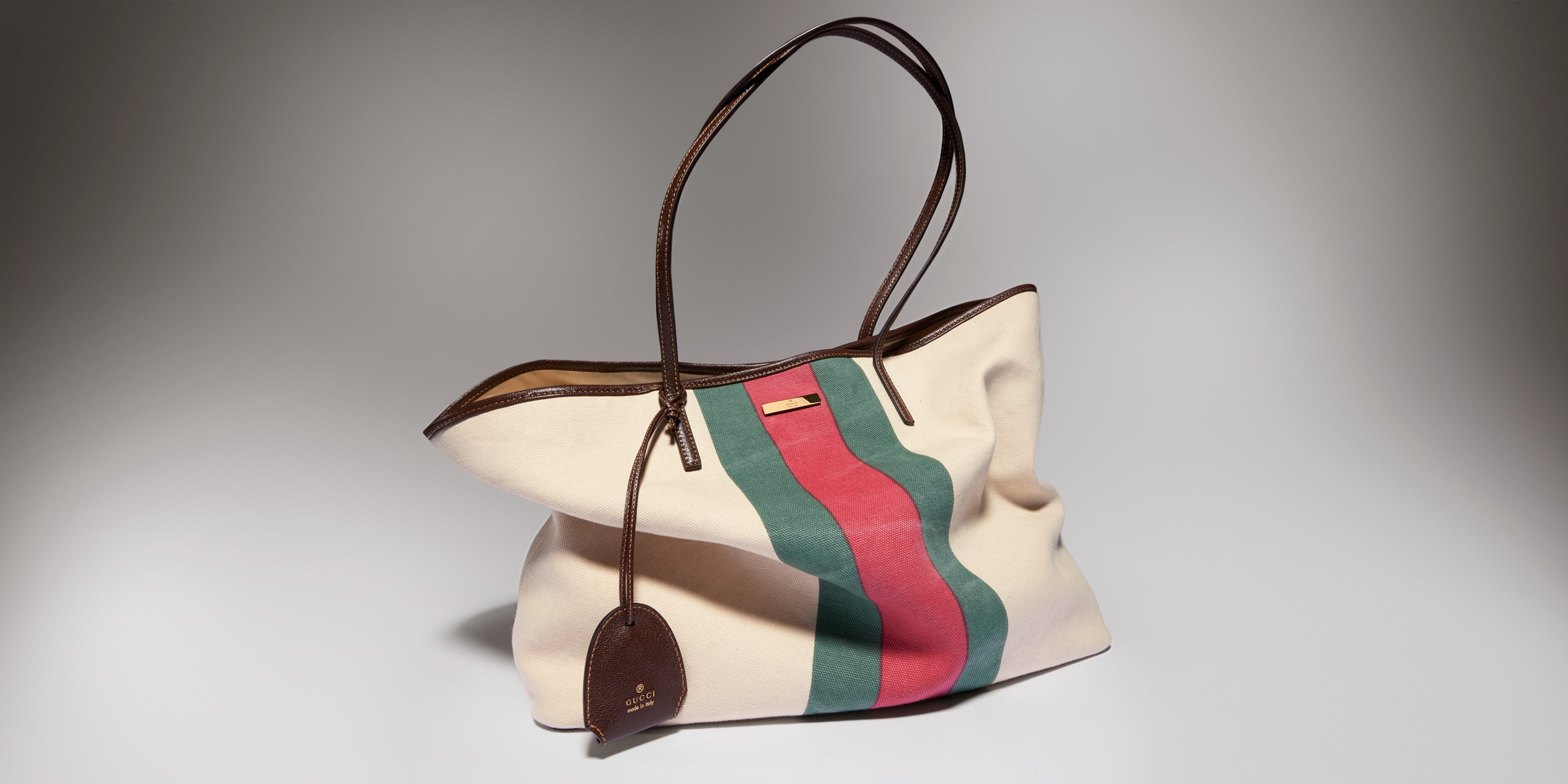 Gucci Tribeca large tote bag with charm in natural canvas | GUCCI® US