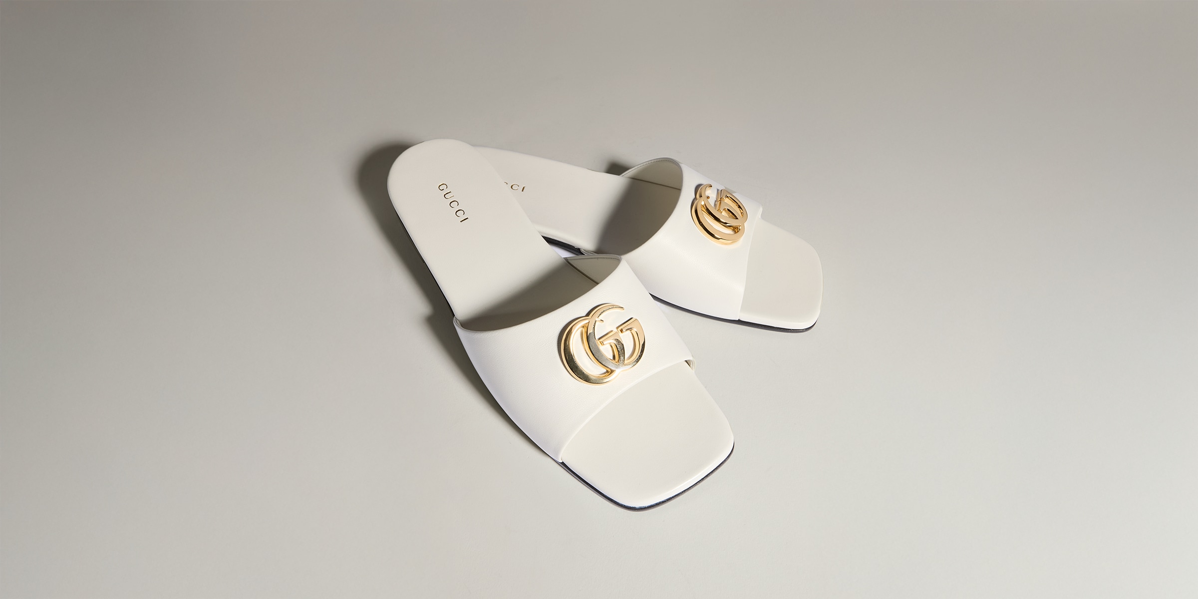 Women's slide sandal with Double G in white leather | GUCCI® ZA