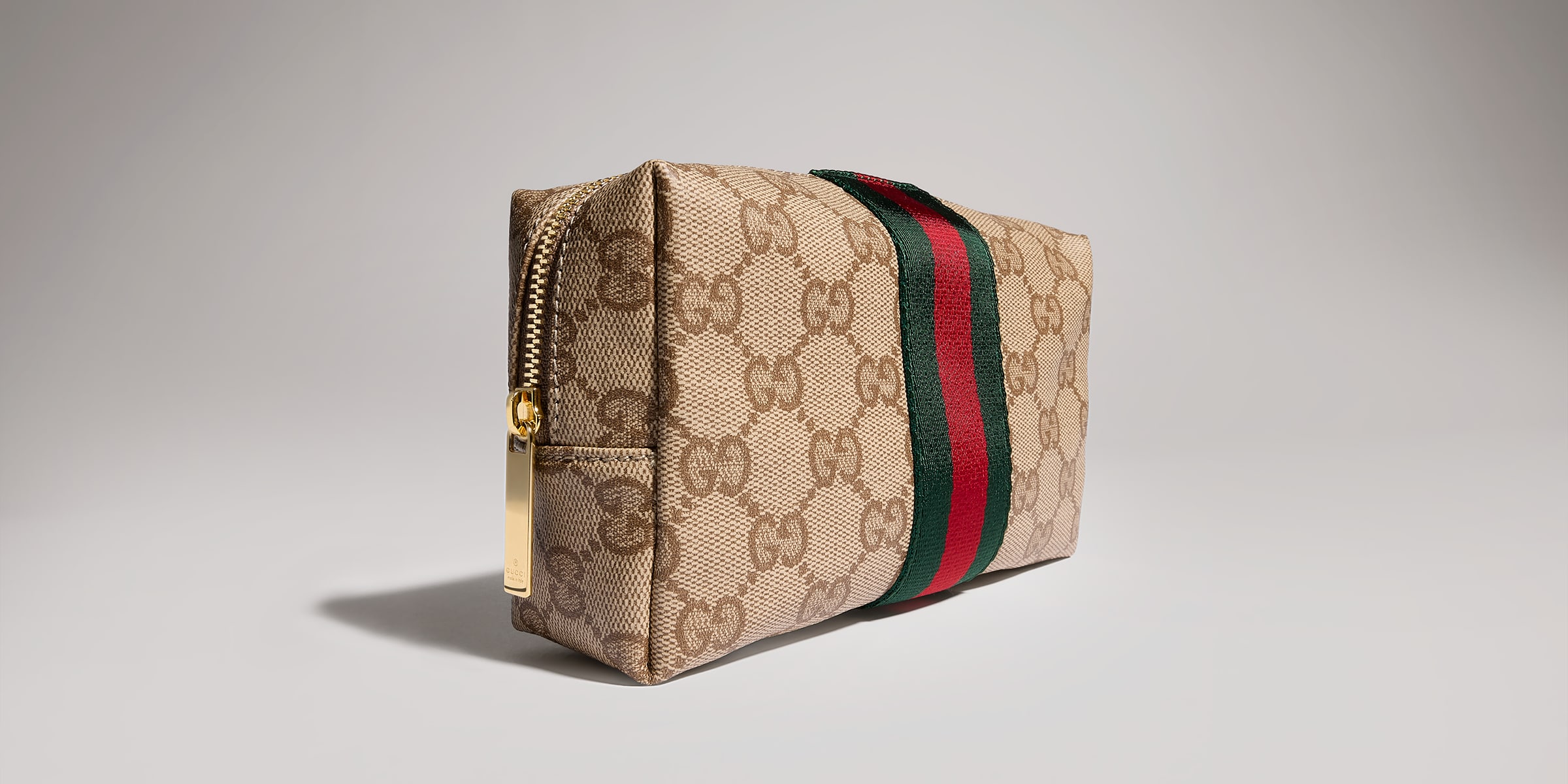 Medium cosmetic case with Web in sand and brown GG canvas | GUCCI® CA