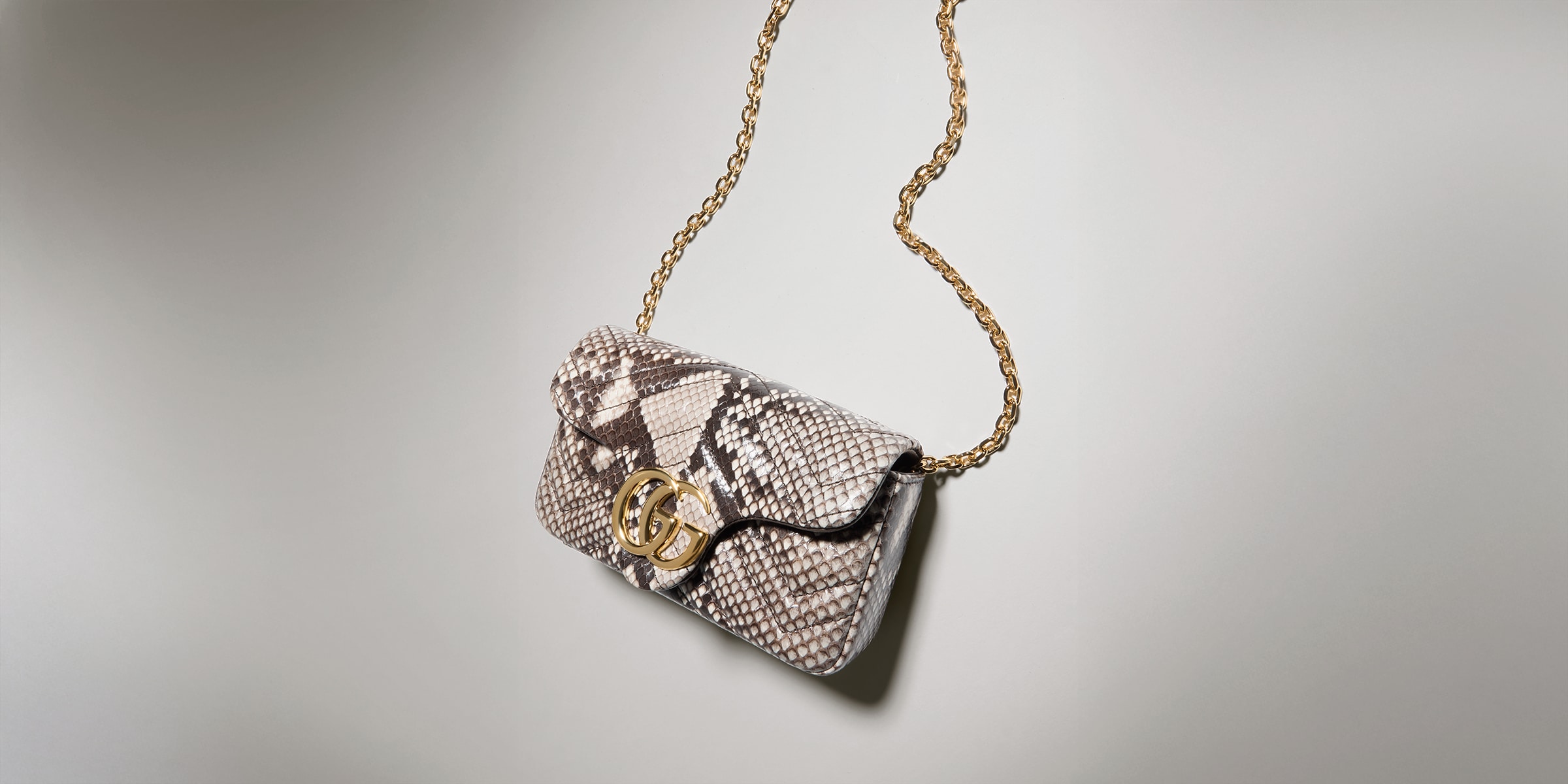 Gucci Python Gg GG Marmont python mini shoulder bag in natural | GUCCI® US