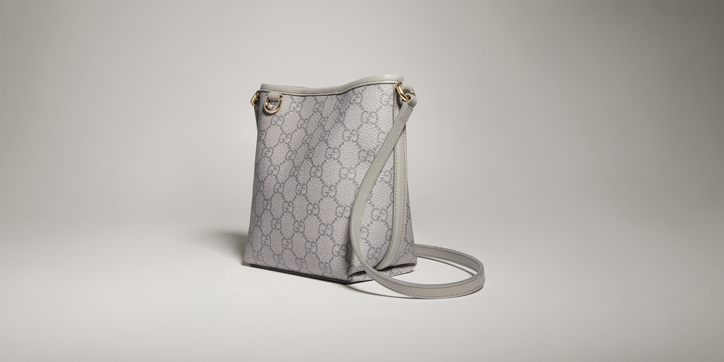 GG Emblem nano bucket bag in grey GG fabric | GUCCI® US