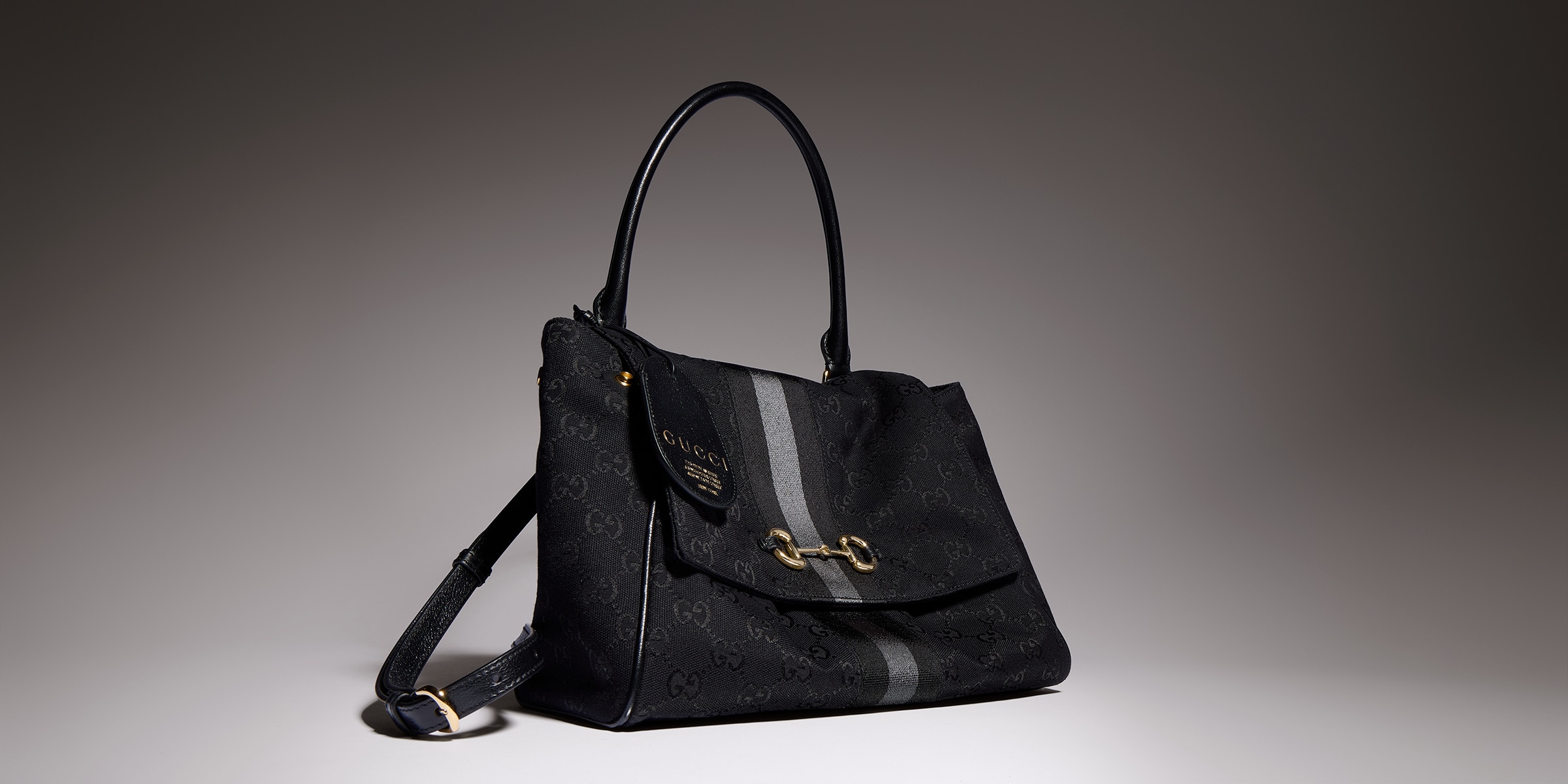 Paparazzo medium top handle bag in grey and black GG canvas