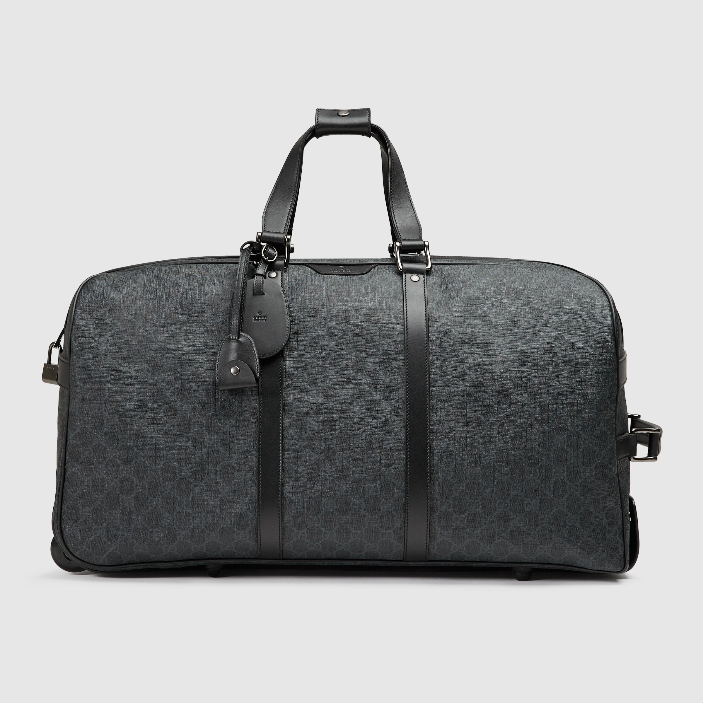 black gucci suitcase