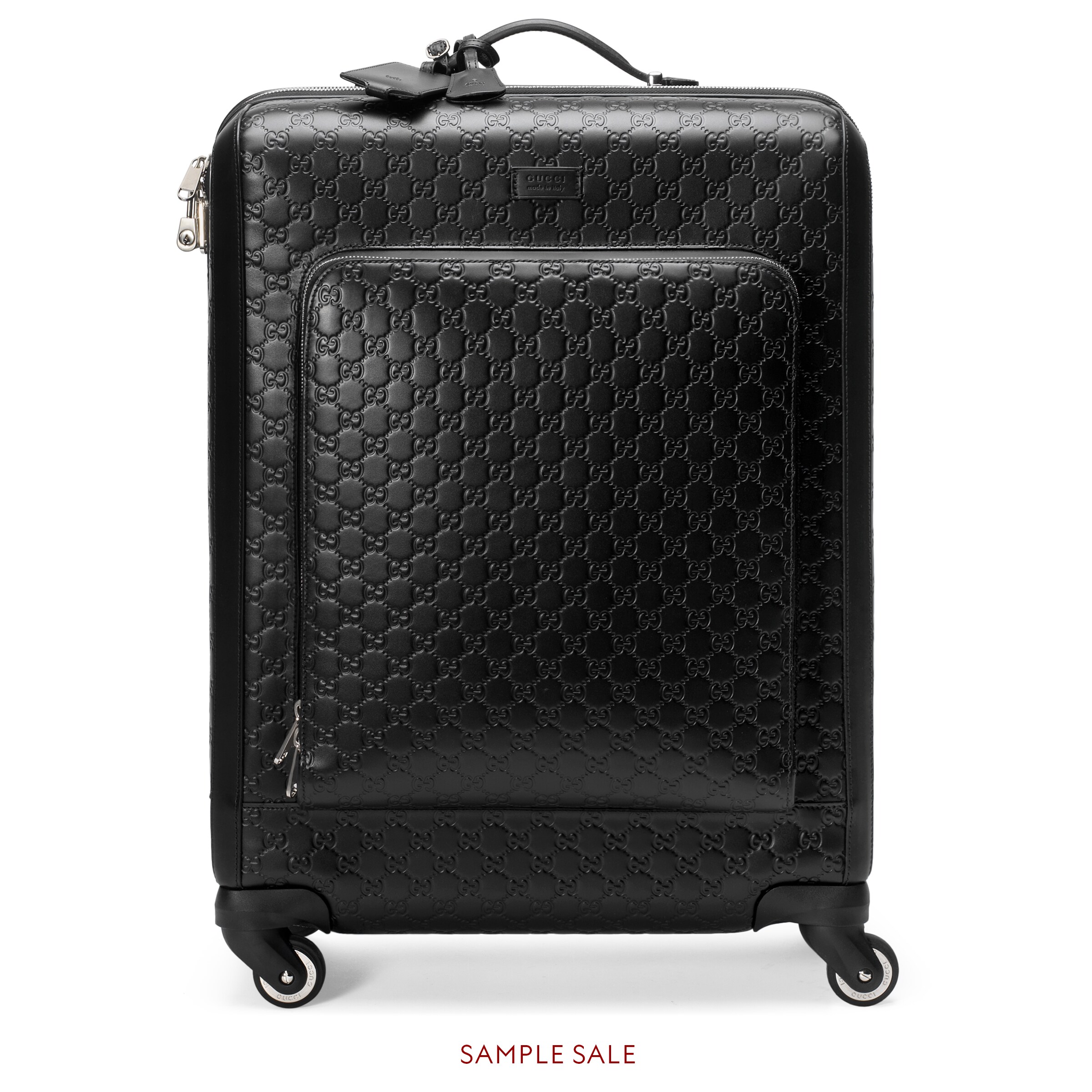 black gucci luggage set