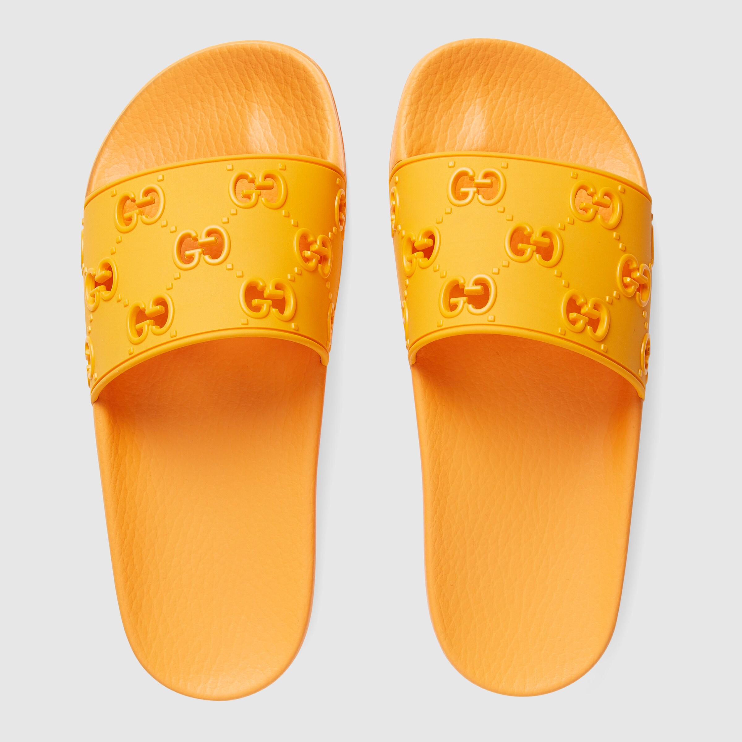 Women's rubber GG slide sandal GUCCI®
