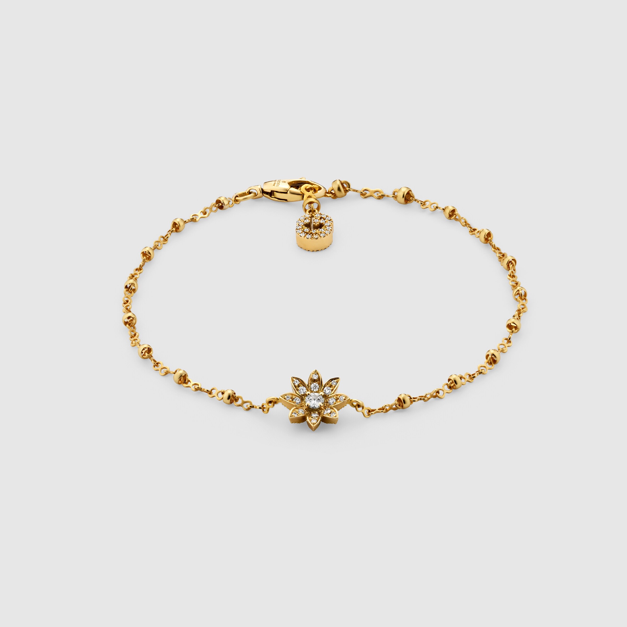 581817_J8540_8000_001_100_0000_Light-Gucci-Flora-18k-bracelet-with-diamonds.jpg