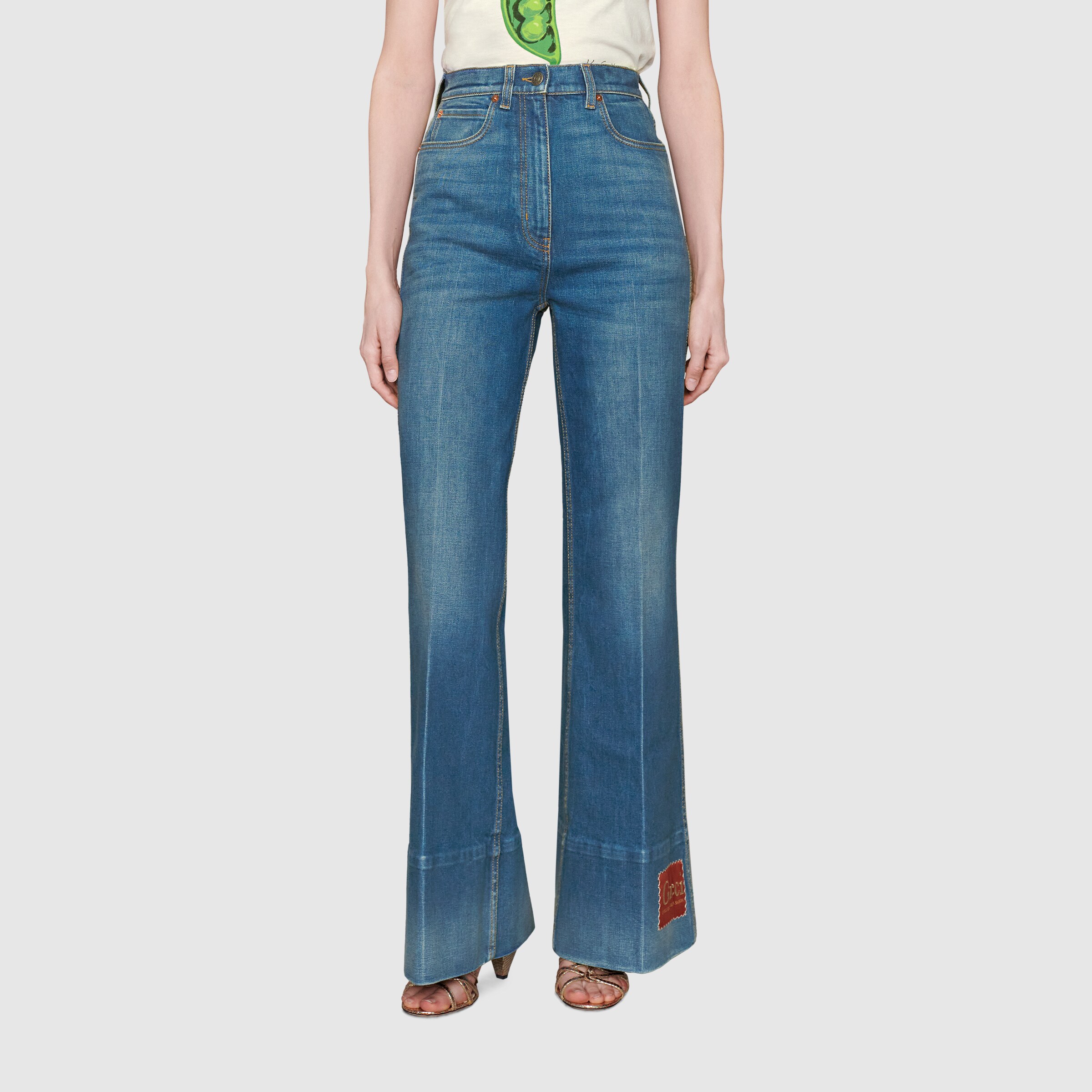 623441_XDA6N_4759_004_100_0000_Light-Washed-denim-flare-trousers-with-Gucci-label.jpg