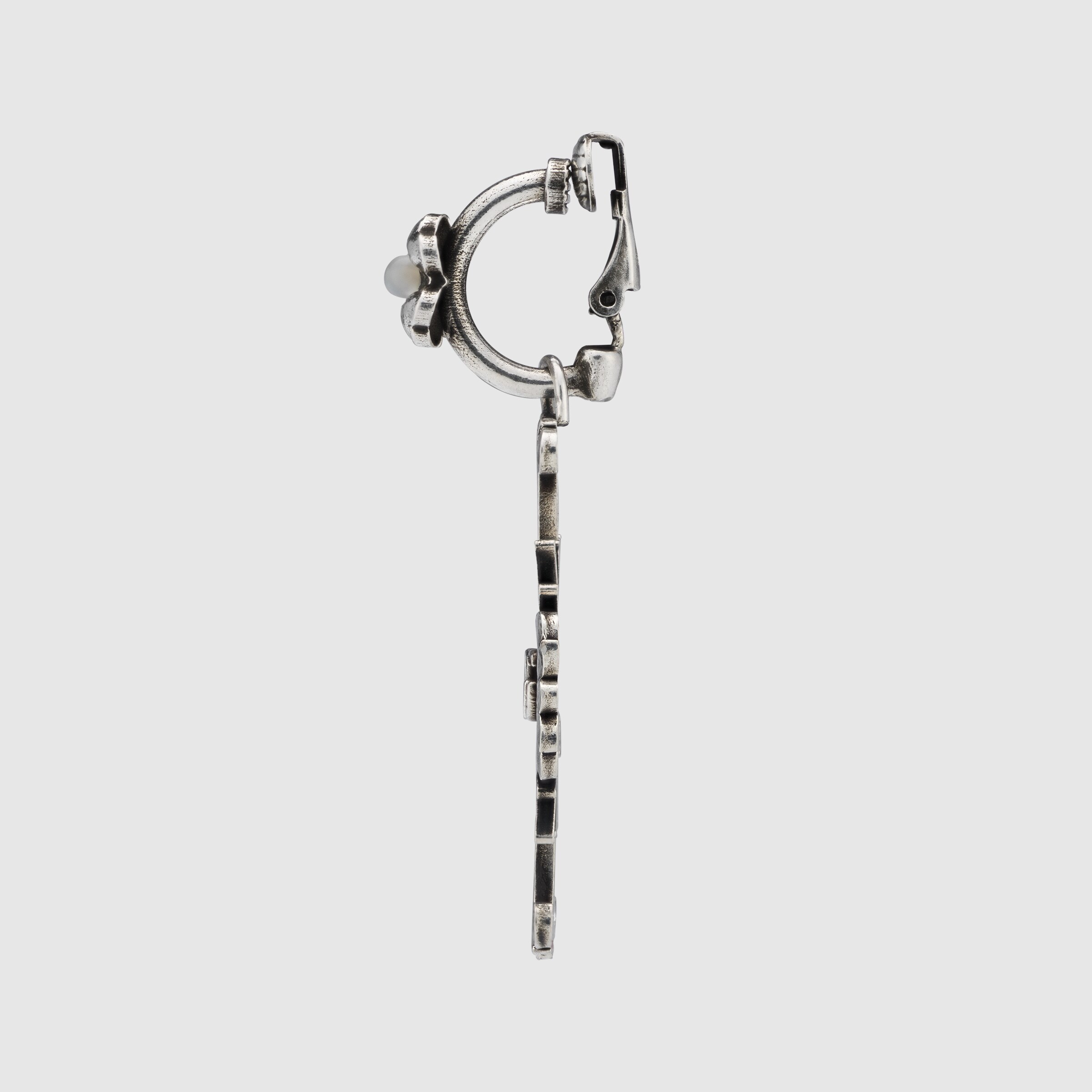 657930_J8440_8184_002_100_0000_Light-Single-earring-with-flower-and-cross.jpg