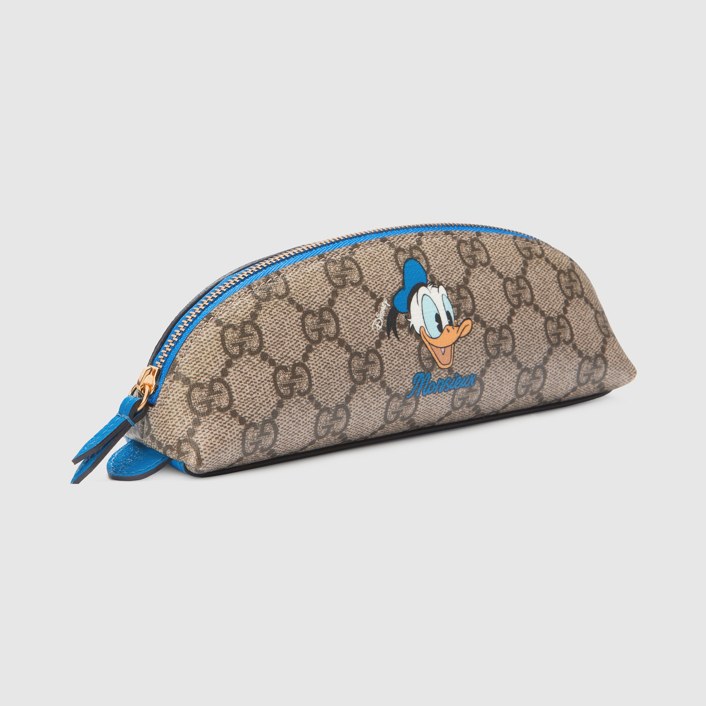 Disney x Gucci Donald Duck pencil case in beige and ebony GG Supreme GUCCI® PL