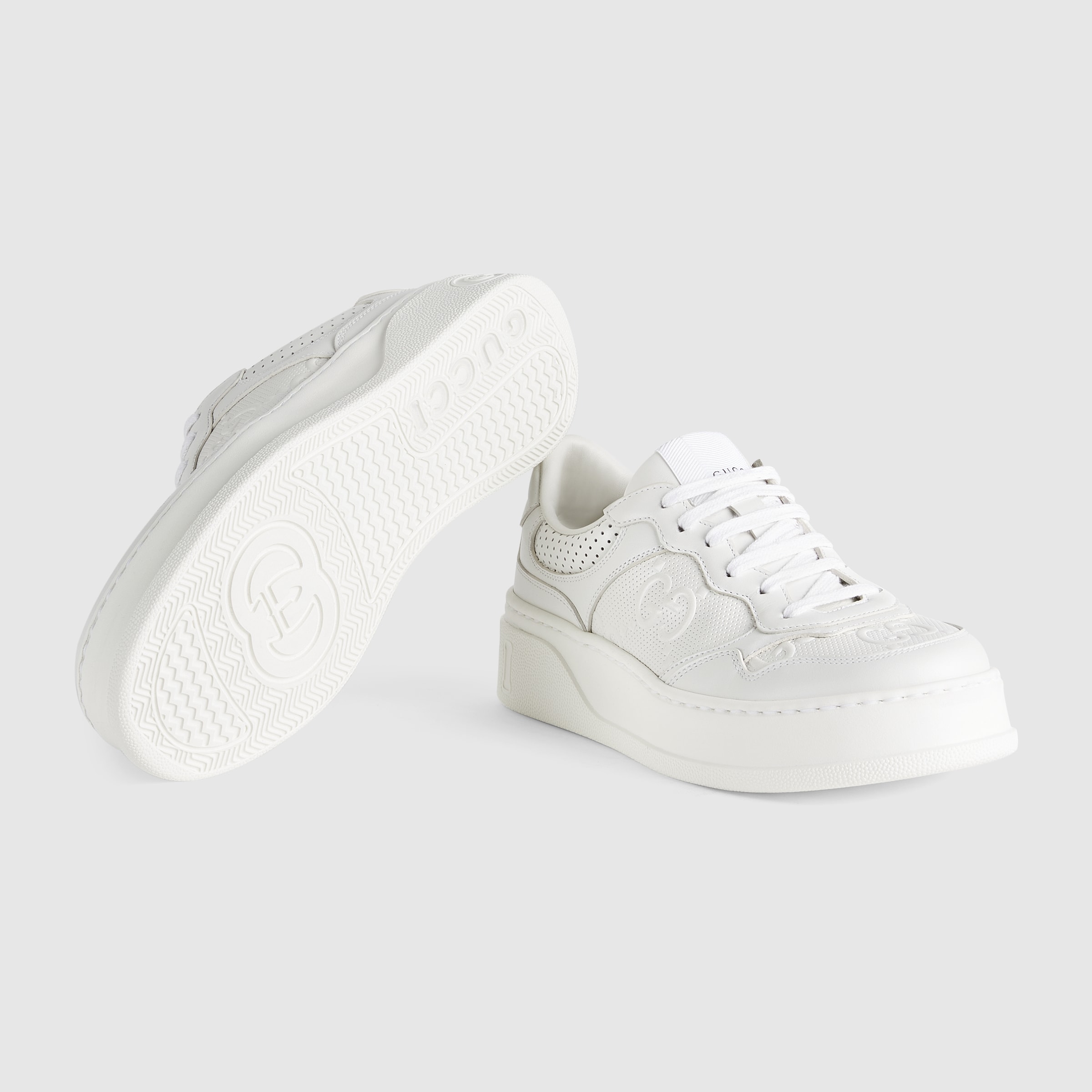 white and gold gucci shoes