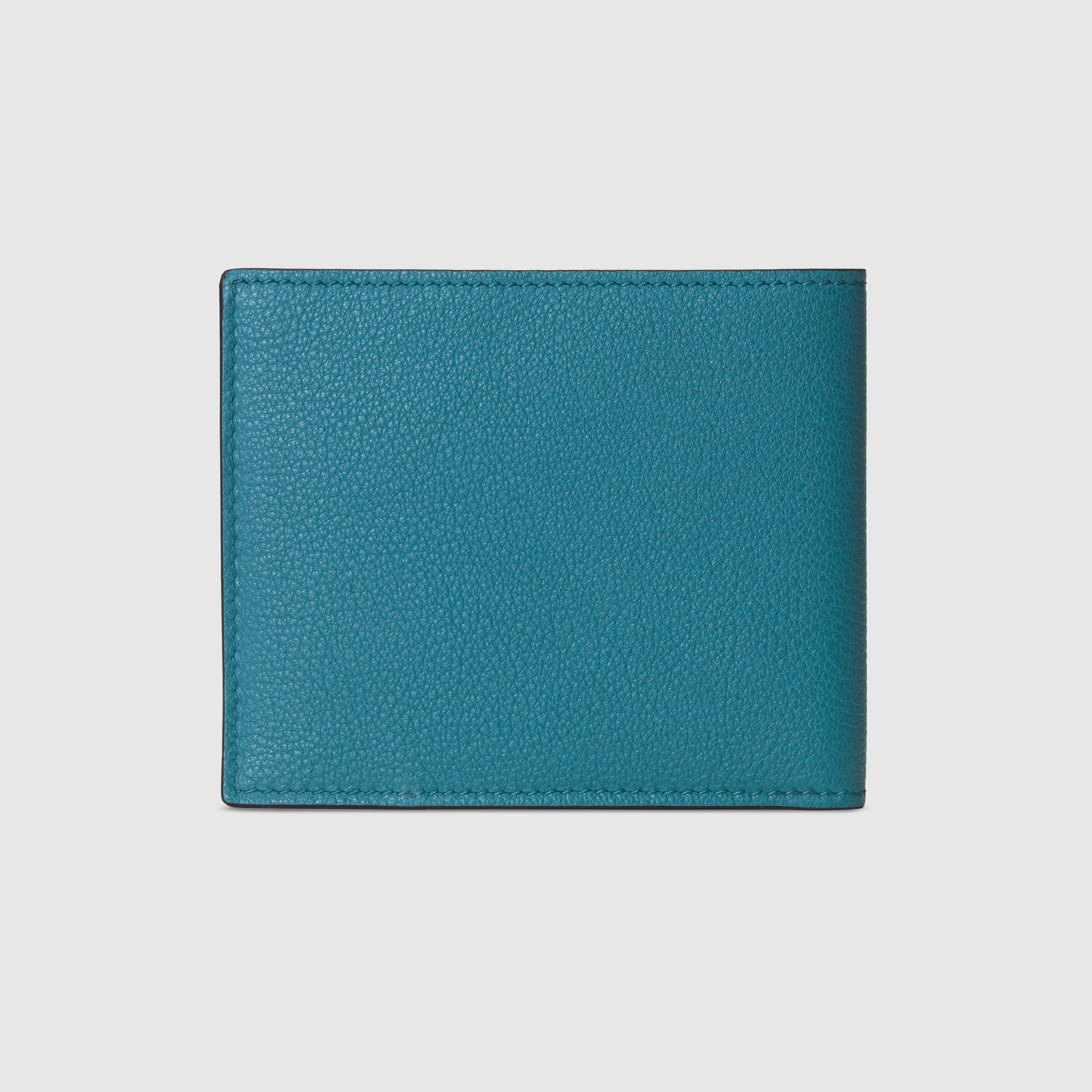 658668_0E8IG_4432_003_080_0000_Light-Wallet-with-embossed-Gucci-logo.jpg