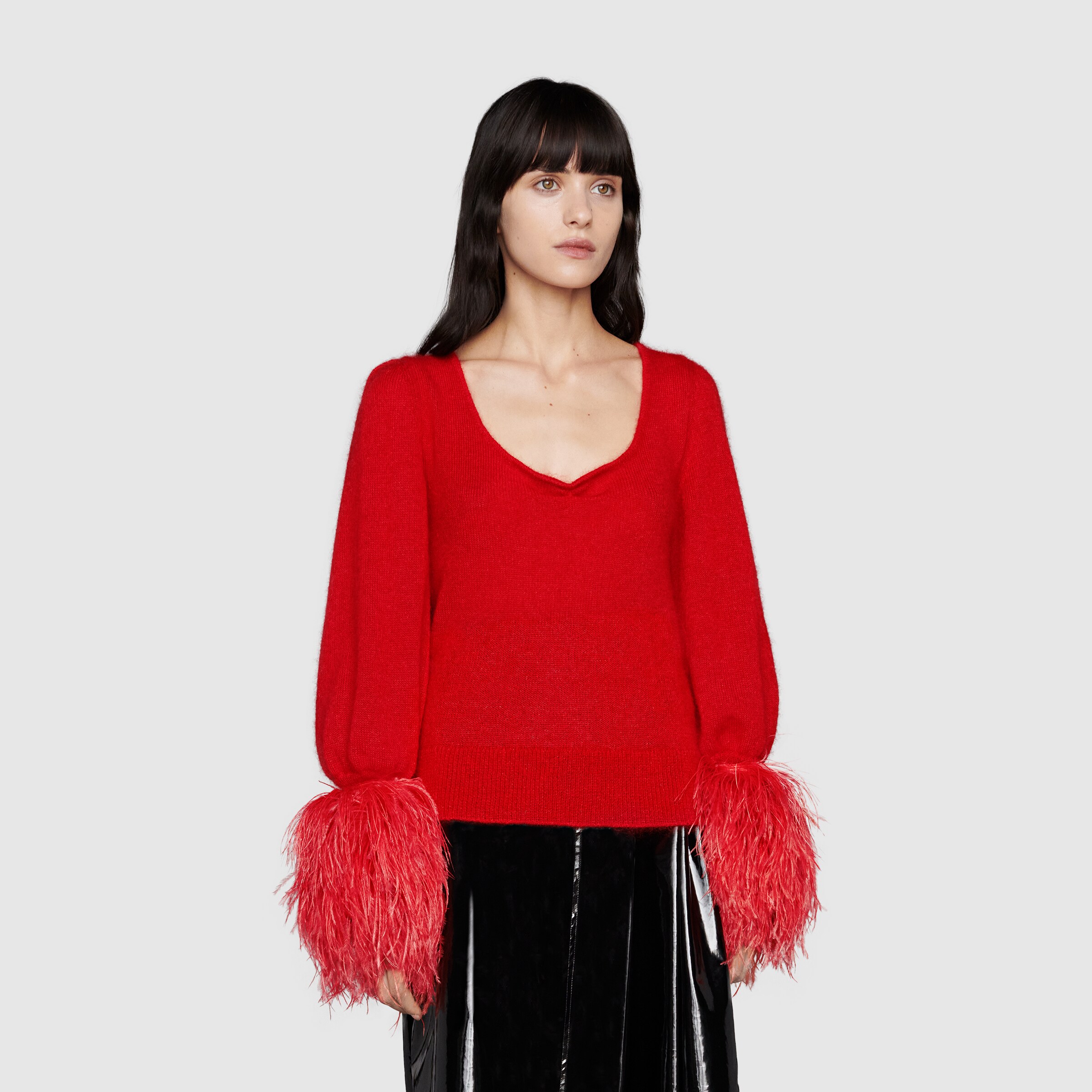 Áo gắn lông ống tay sweater len