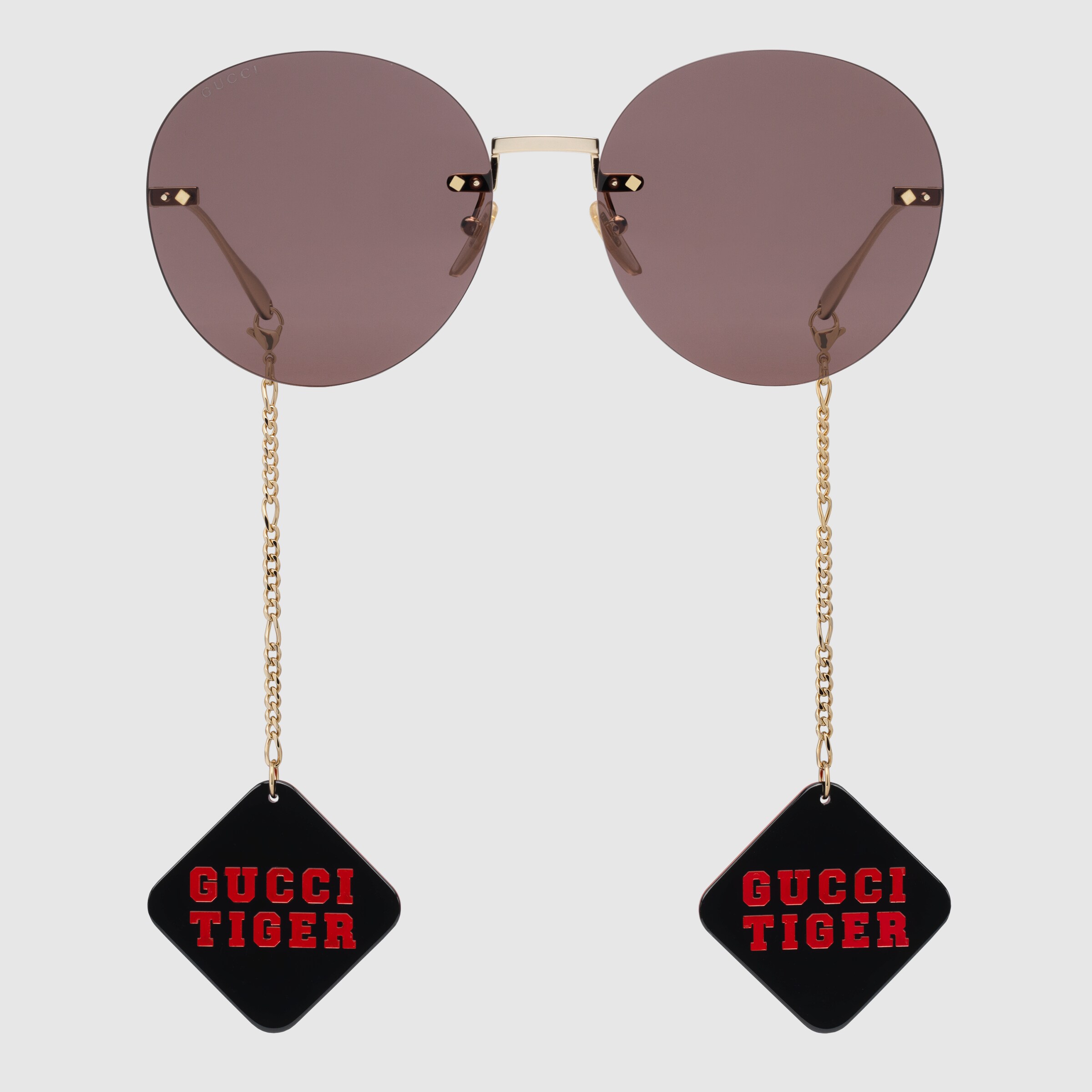 690989_I3330_8021_001_100_0000_Light-Gucci-Tiger-round-frame-sunglasses-with-pendant.jpg
