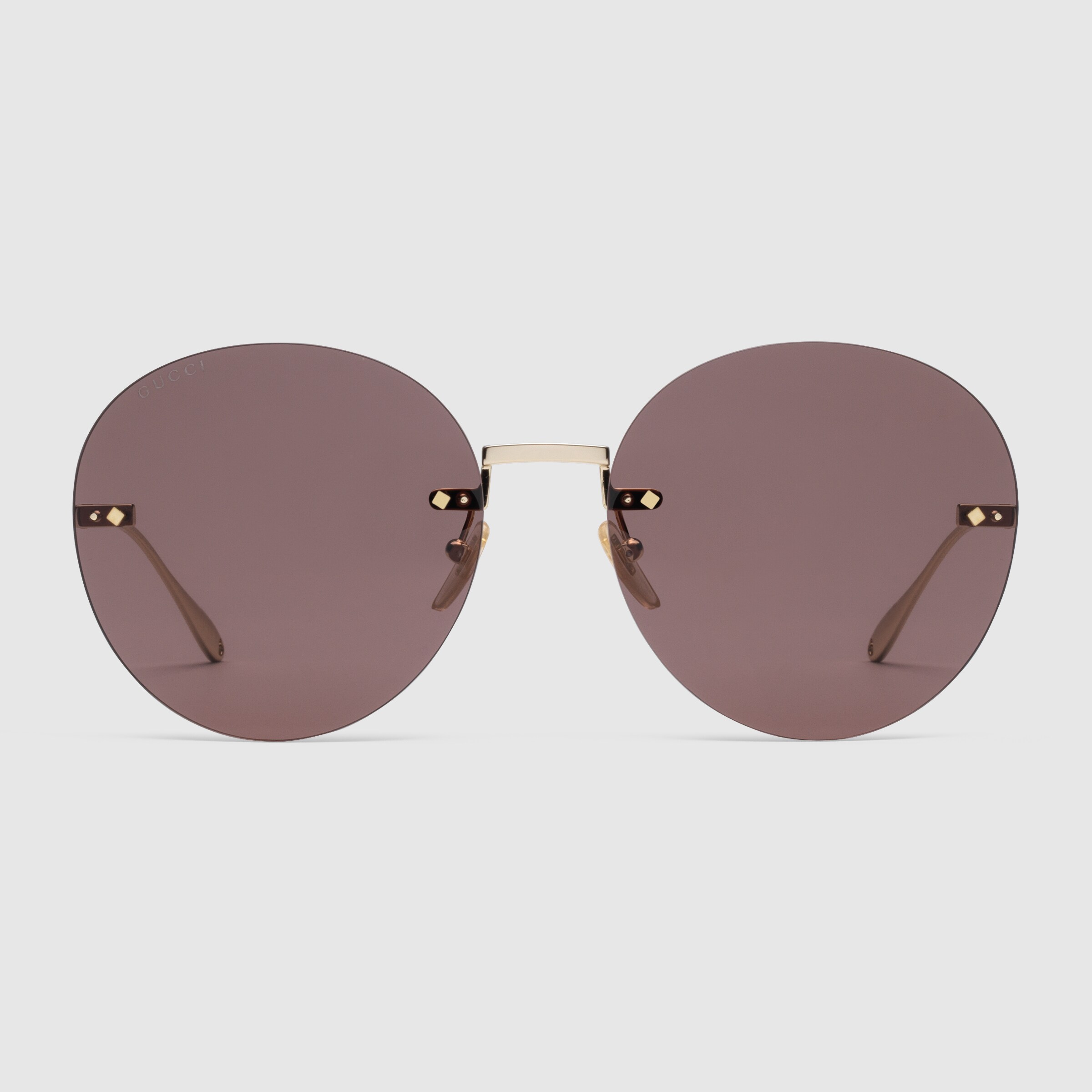 690989_I3330_8021_002_100_0000_Light-Gucci-Tiger-round-frame-sunglasses-with-pendant.jpg