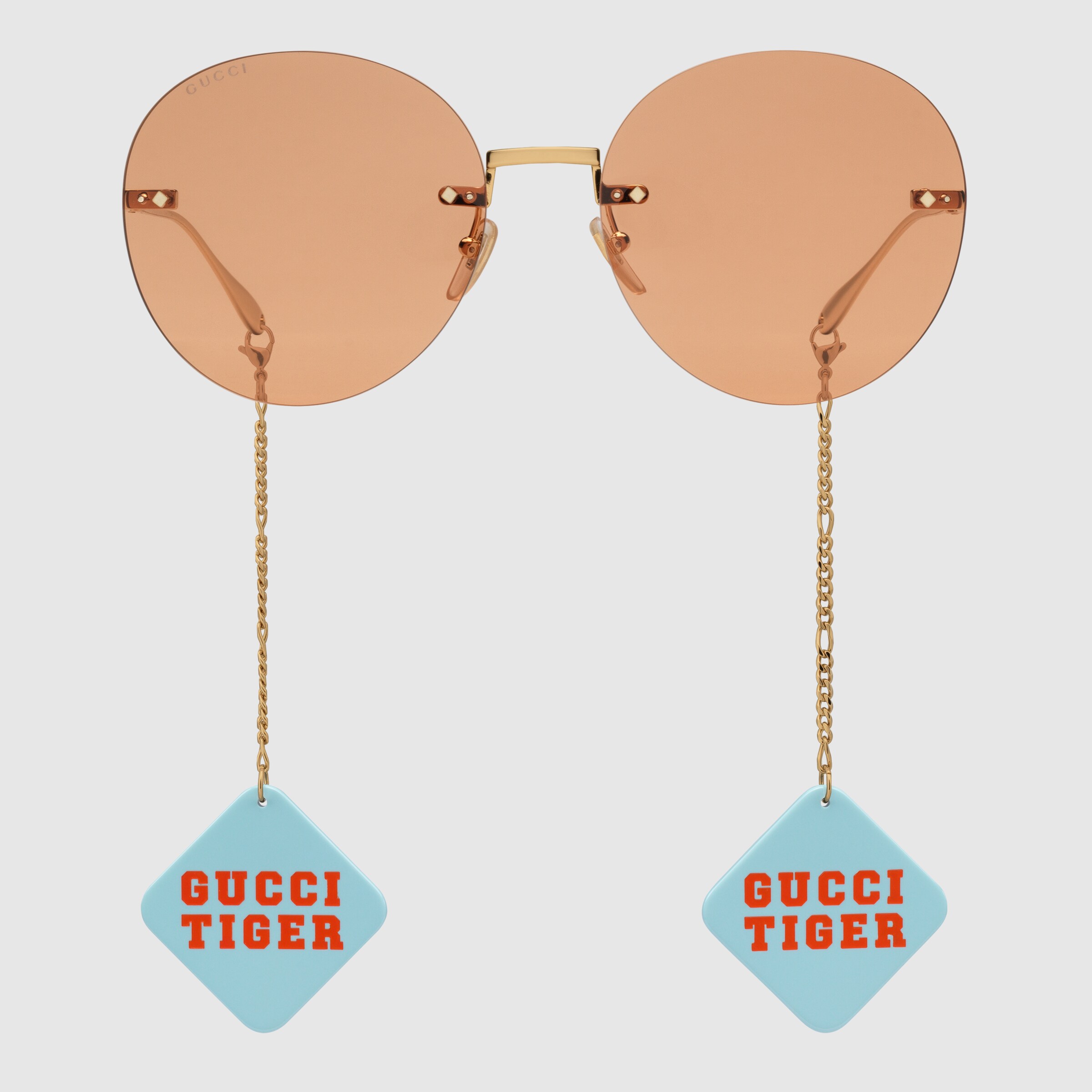 690989_I3330_8075_001_100_0000_Light-Gucci-Tiger-round-frame-sunglasses-with-pendant.jpg