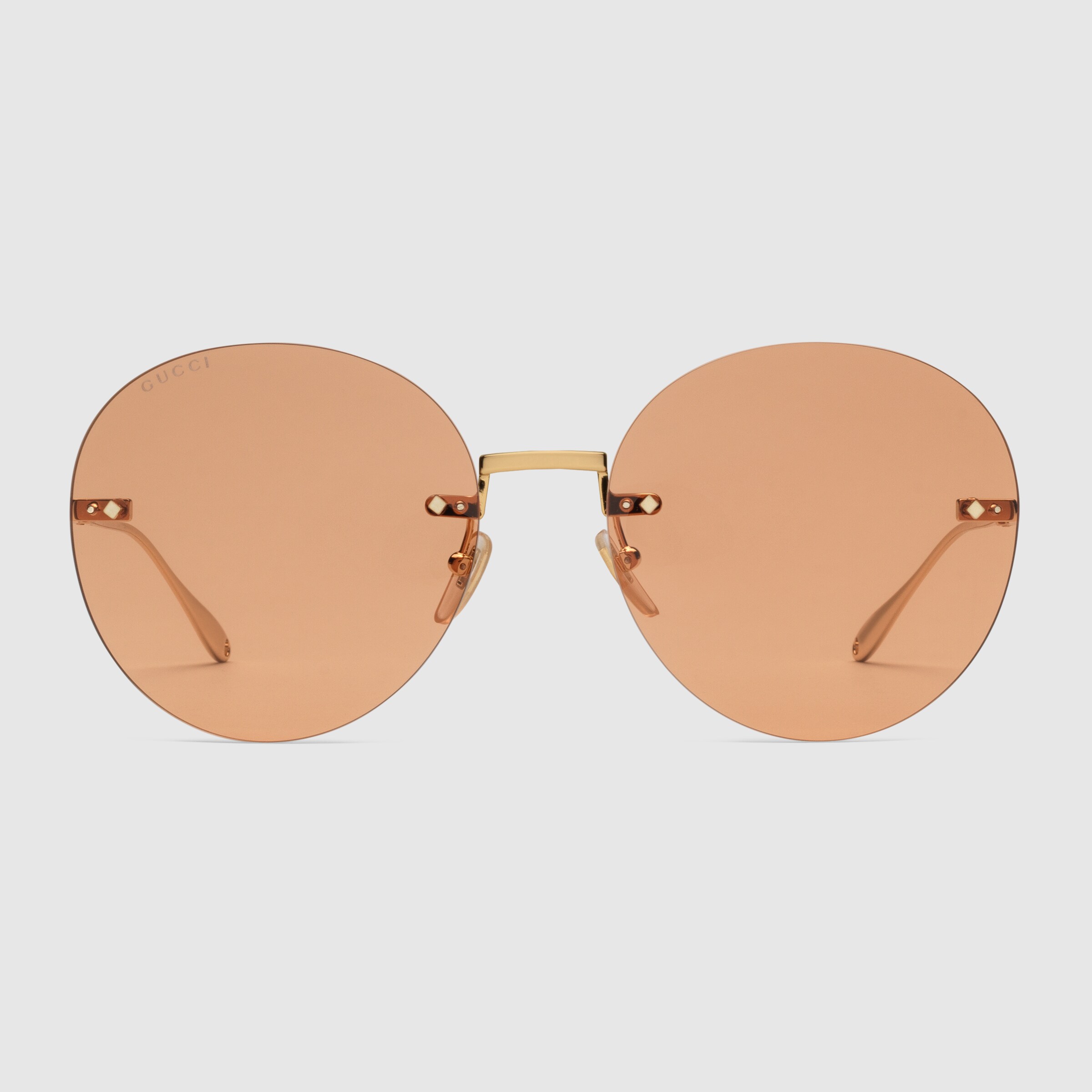 690989_I3330_8075_002_100_0000_Light-Gucci-Tiger-round-frame-sunglasses-with-pendant.jpg