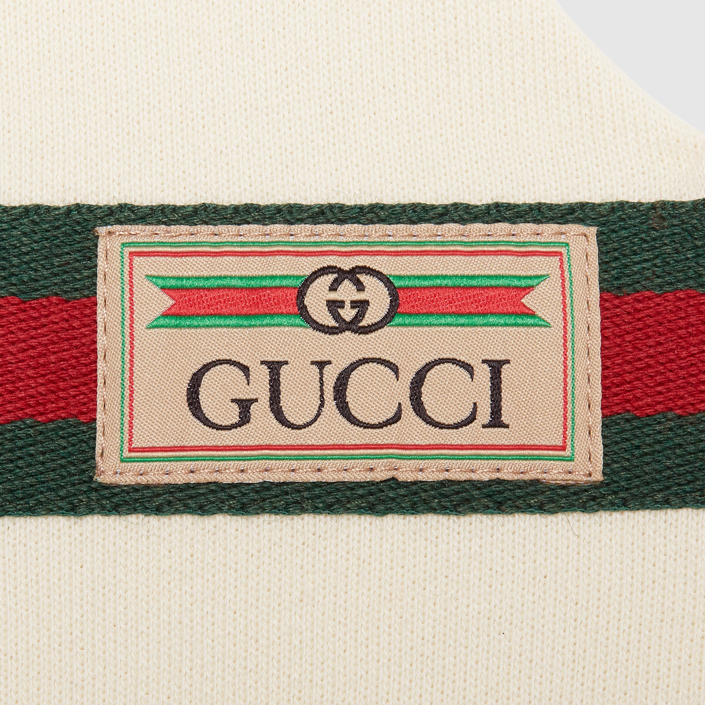 670968_XJDKA_9061_012_100_0000_Light-Baby-cotton-one-piece-with-Gucci-label.jpg