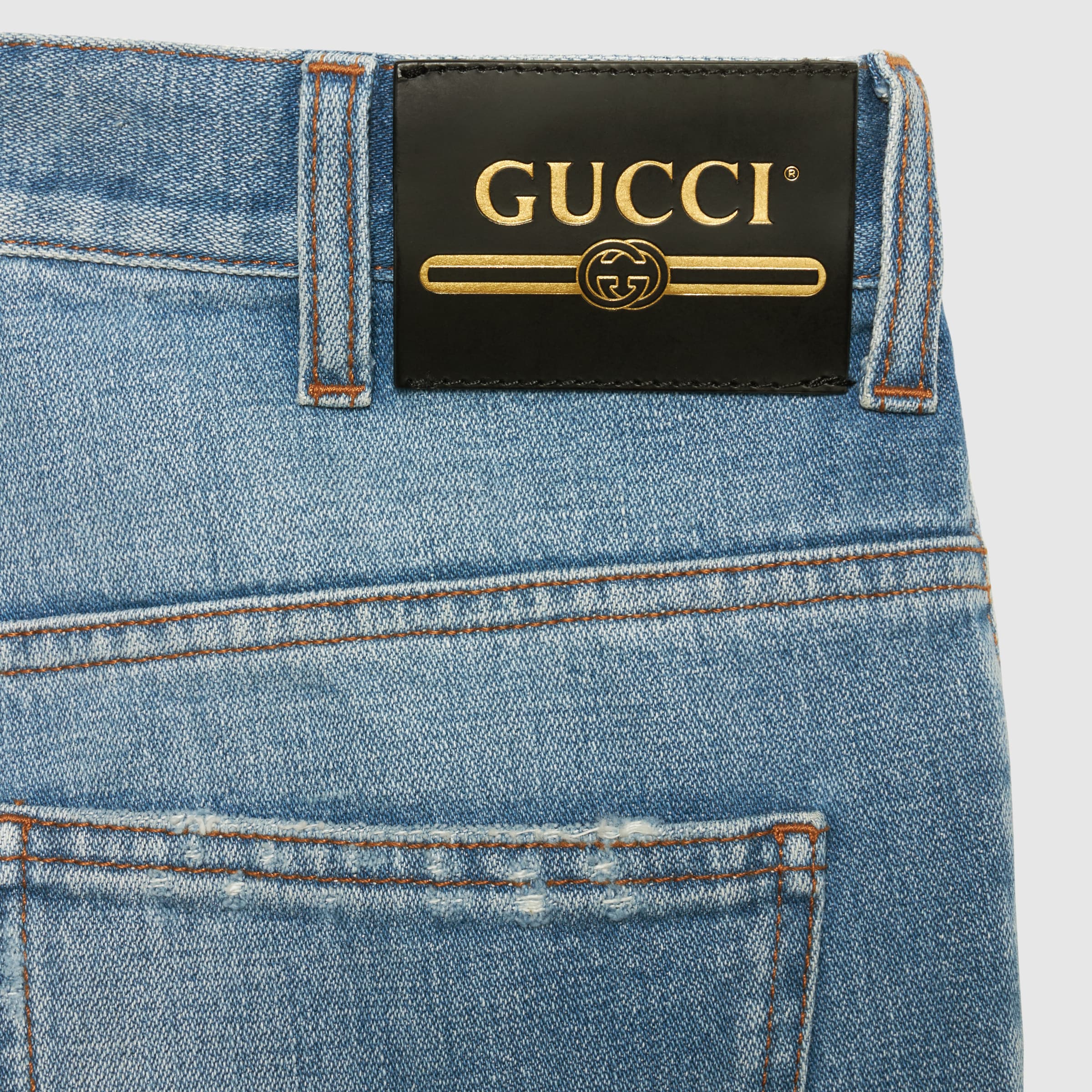683725_XDBV3_4447_011_100_0000_Light-Gucci-Tiger-denim-pant-with-embroidery.jpg