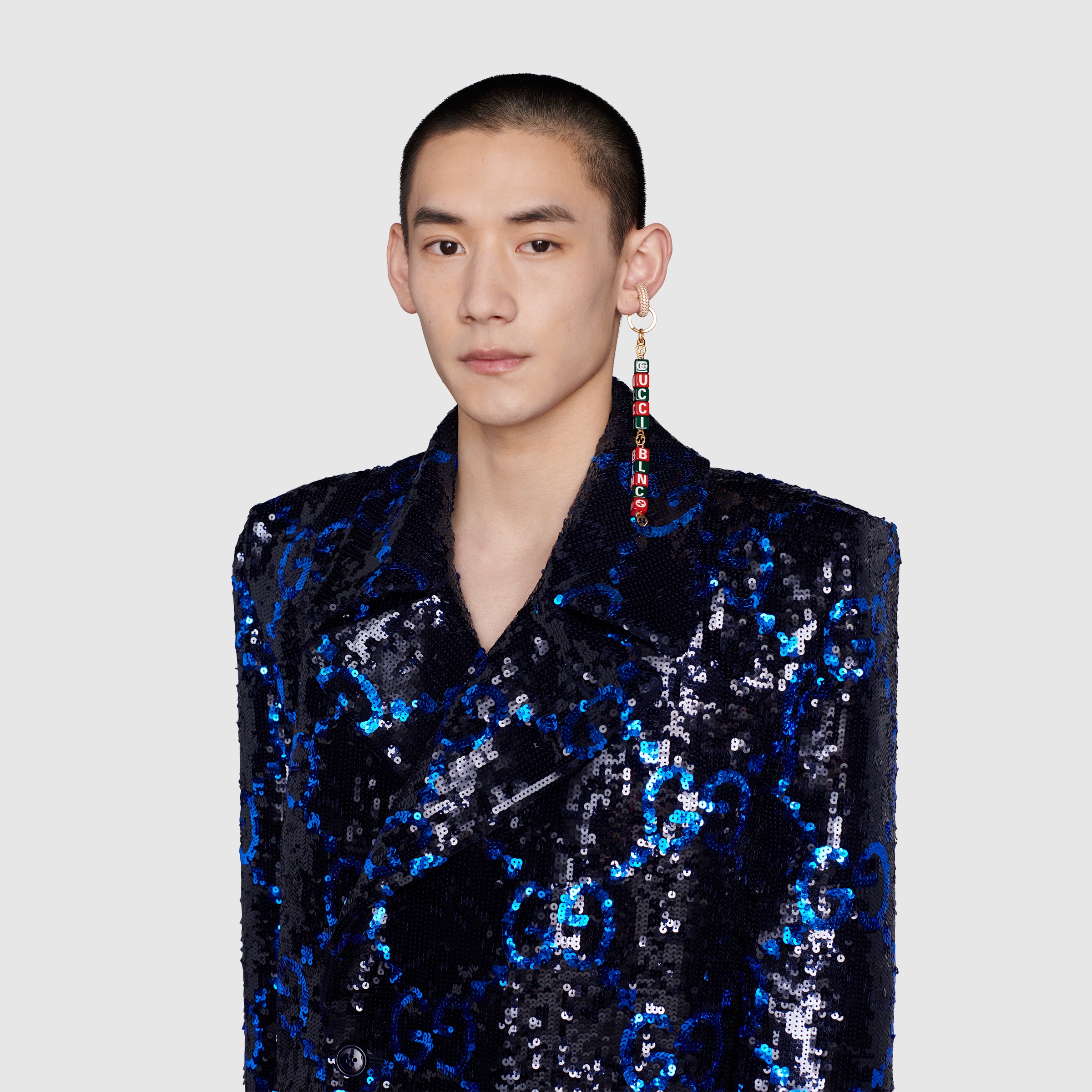 677108_I9354_8518_009_100_0000_Light-The-Hacker-Project-single-earring-with-symbols.jpg