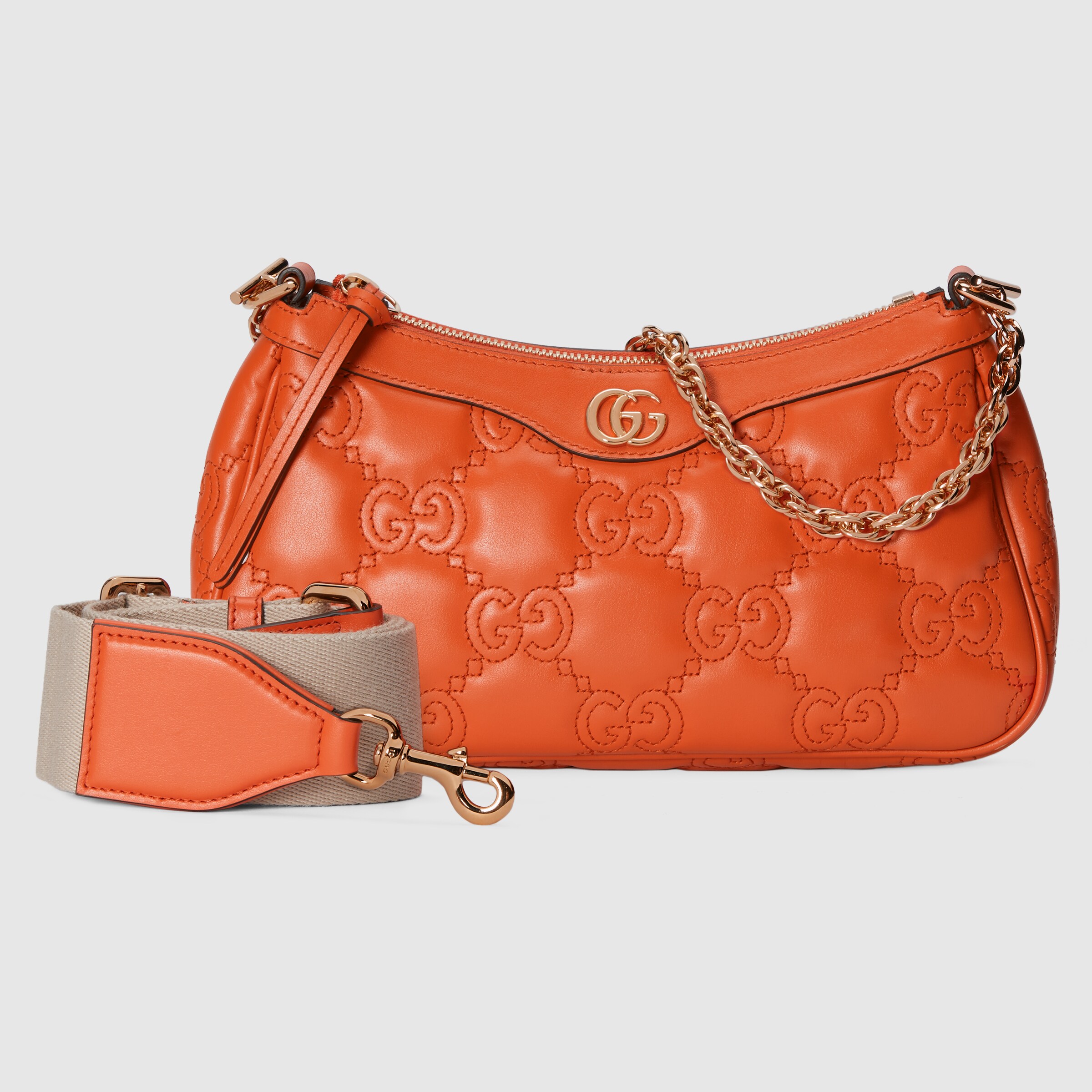 GG Matelassé handbag in orange leather GUCCI® US
