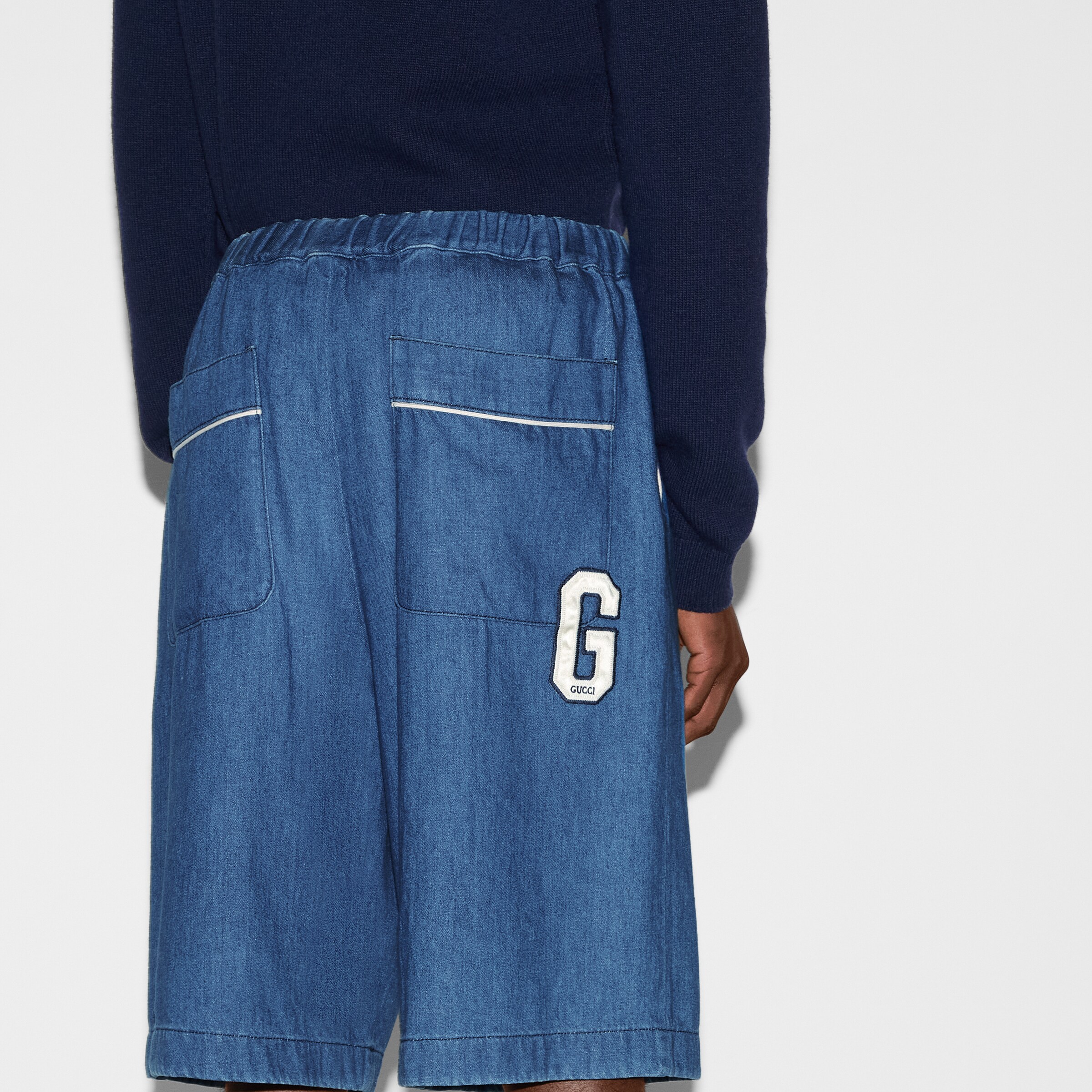 Denim shorts with G Gucci patch in blue GUCCI® Canada