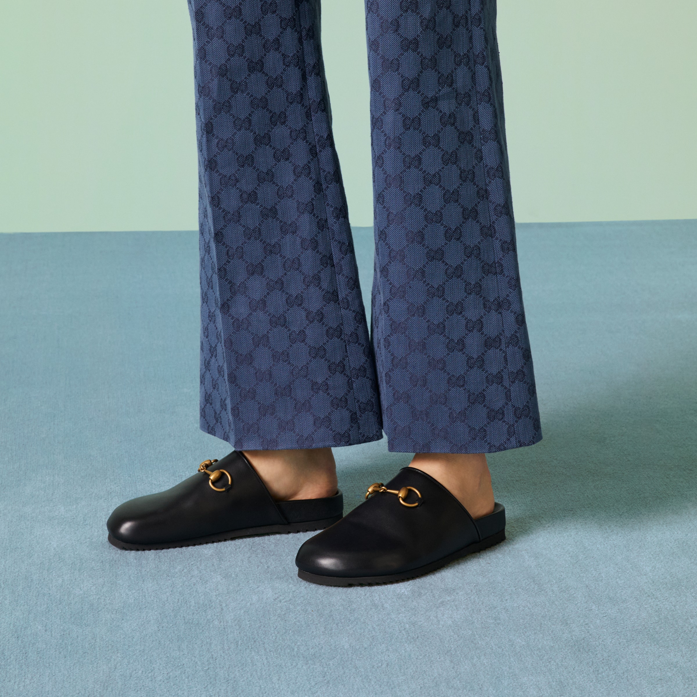 Women's Horsebit slipper in black leather GUCCI® IE