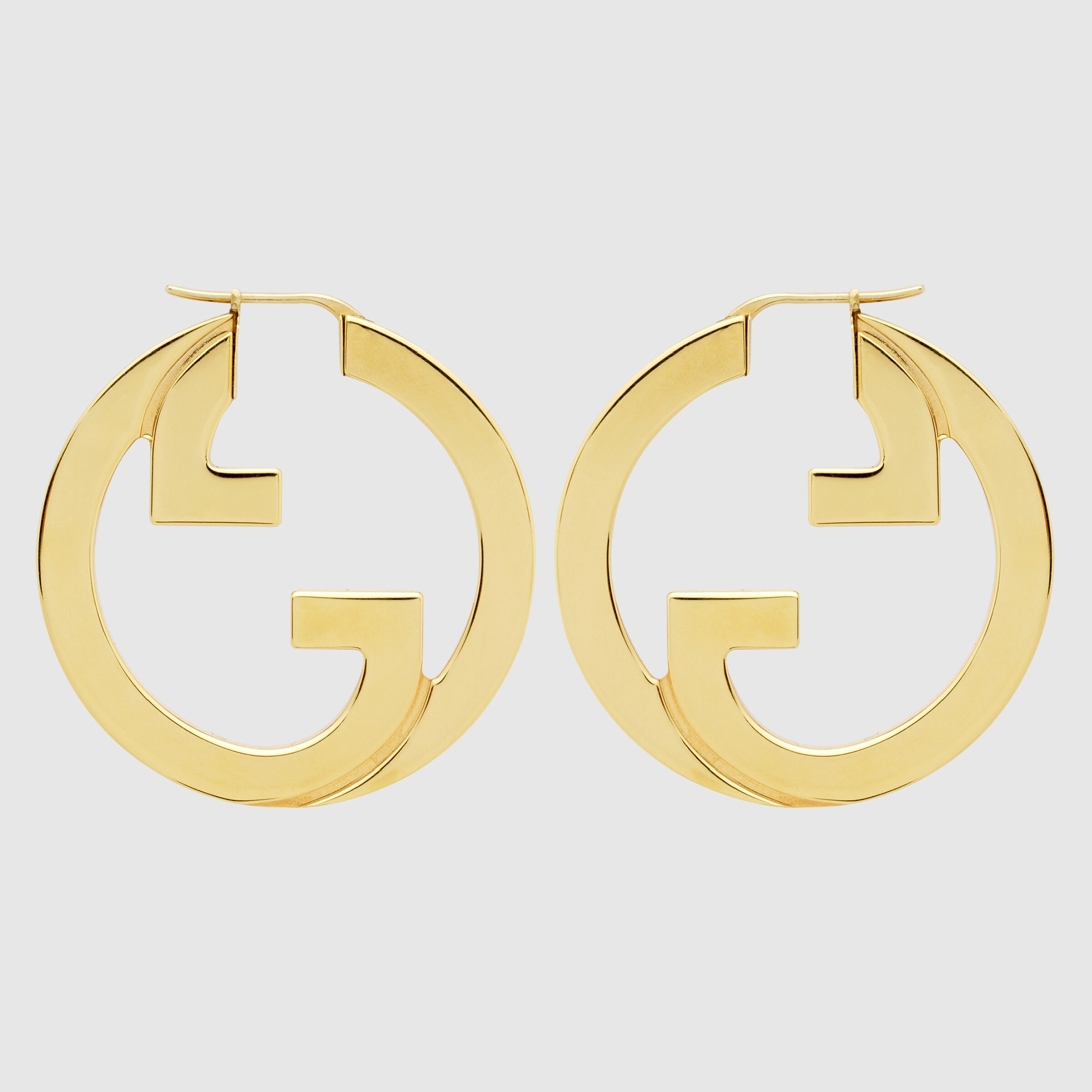 Gucci Blondie hoop earrings in gold-toned metal | GUCCI® CA
